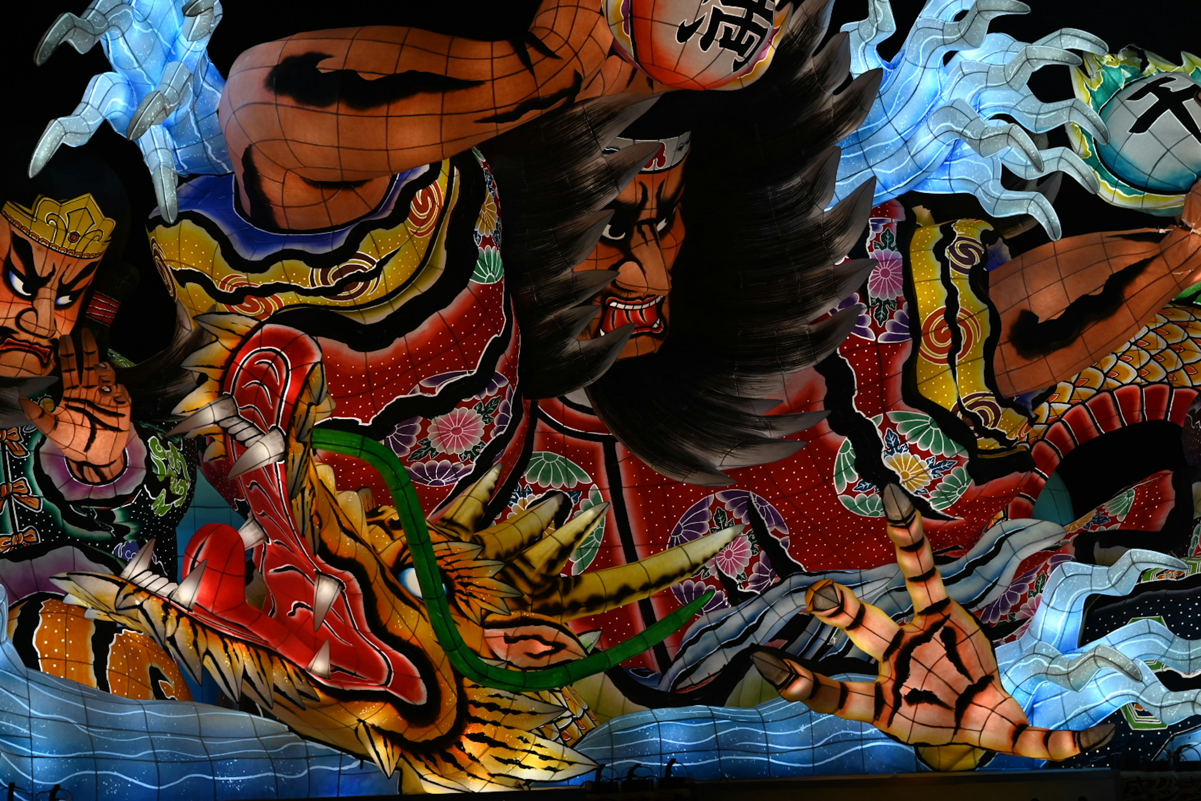 Vibrant traditional Japanese art depicting a dragon and powerful warriors in battle