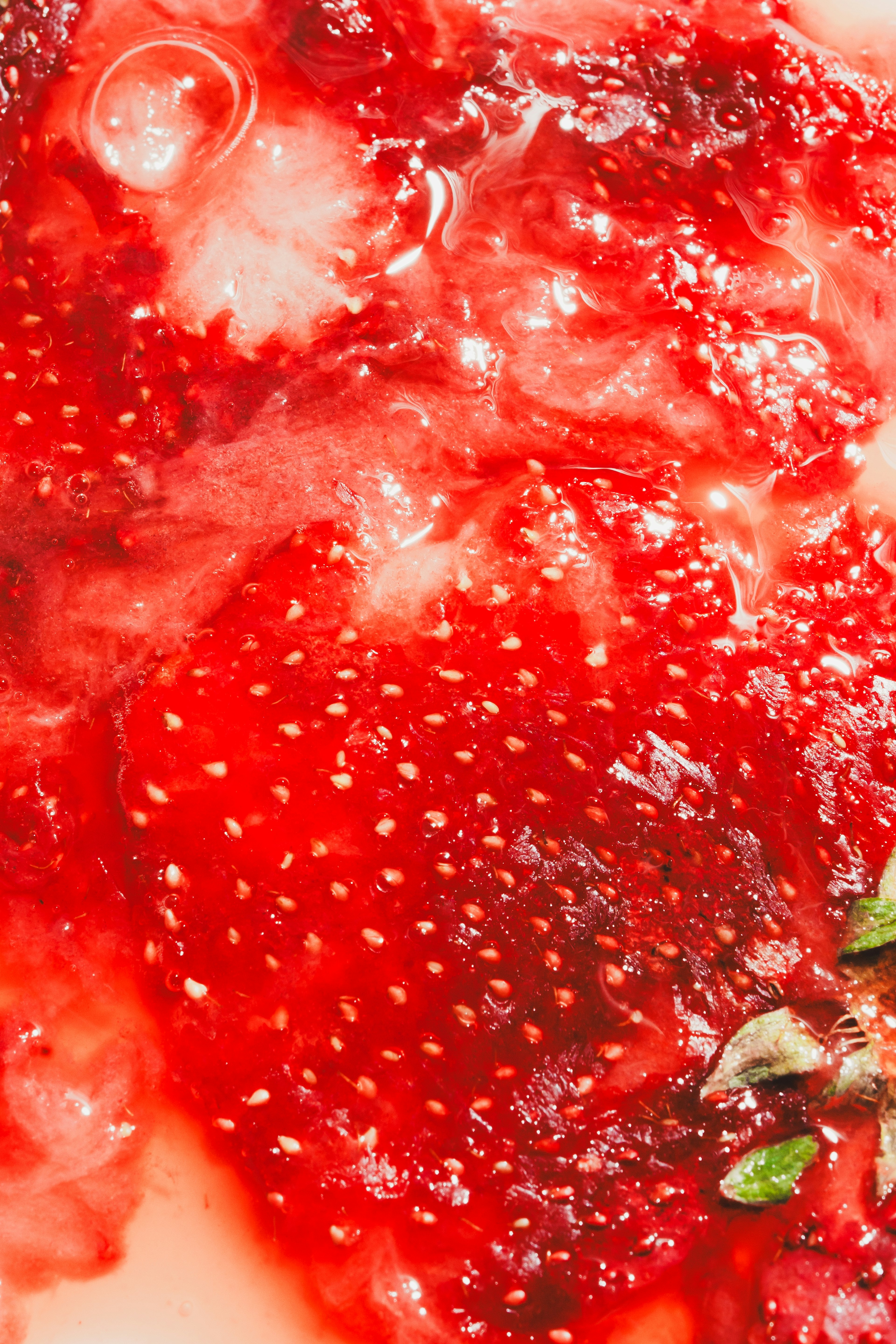 Close-up of a red strawberry vibrant color and moisture