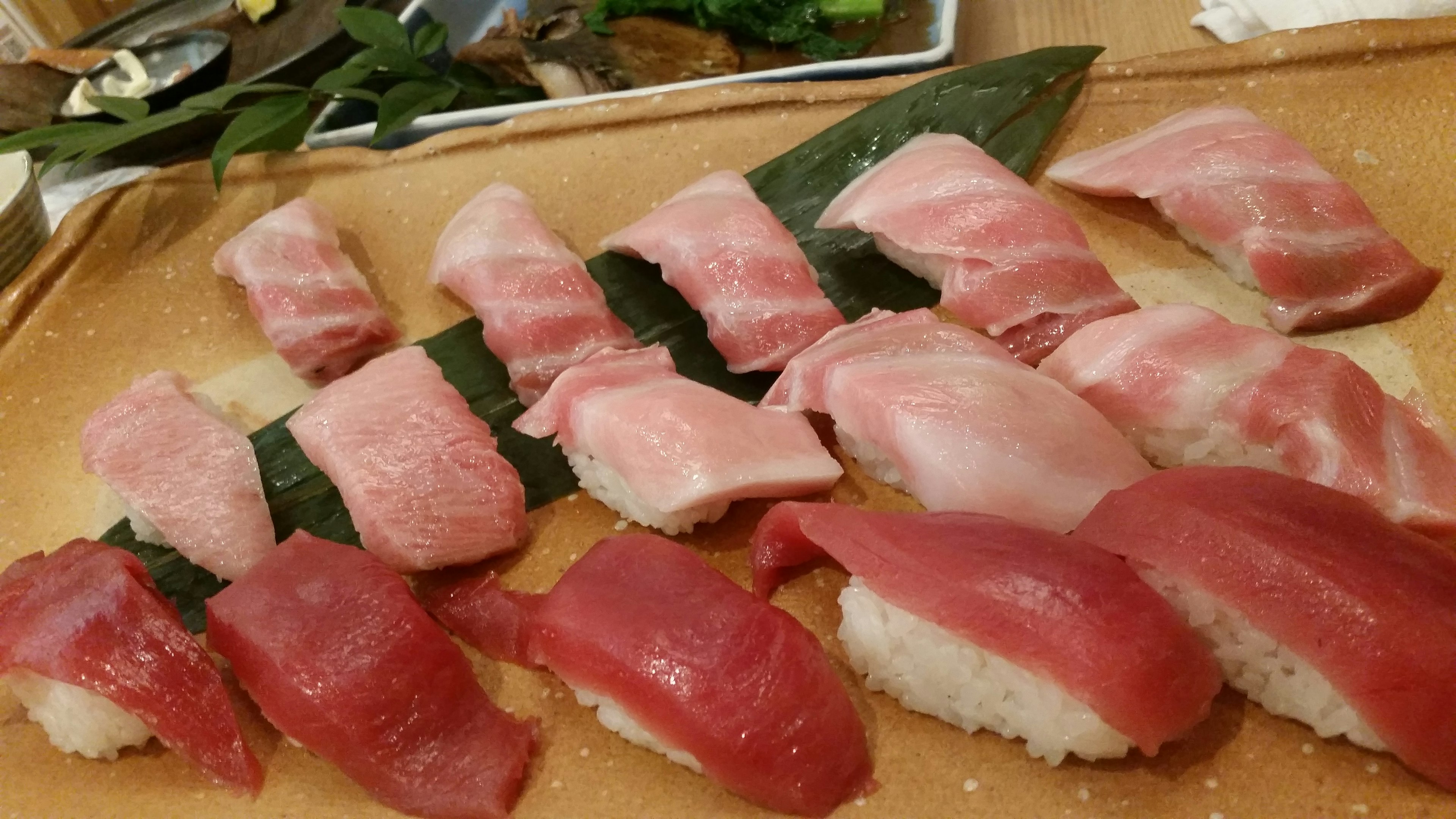 Assortment of fresh sushi featuring fatty tuna and rice