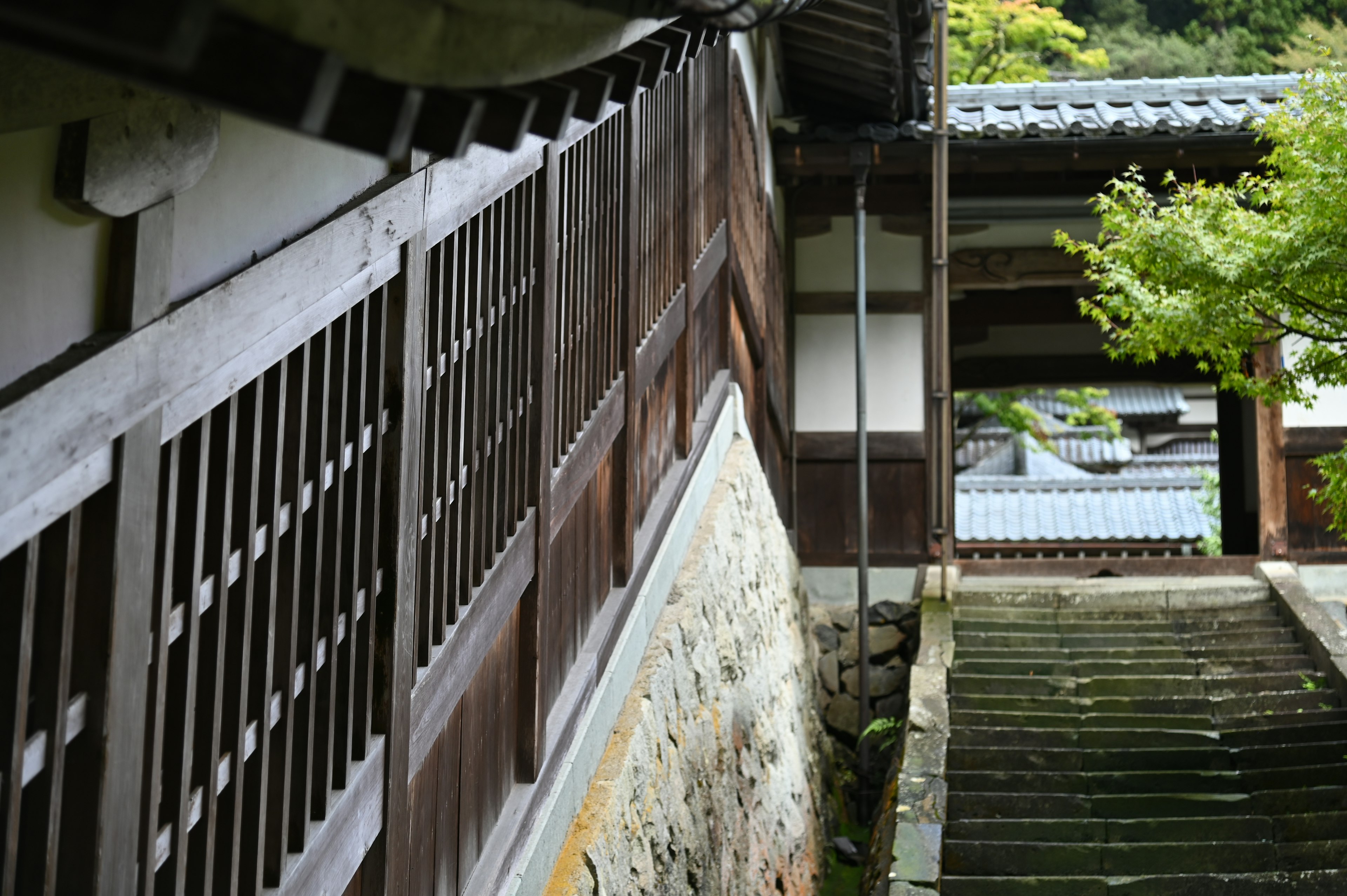 Traditional Japanese architecture with stairs and wooden railing