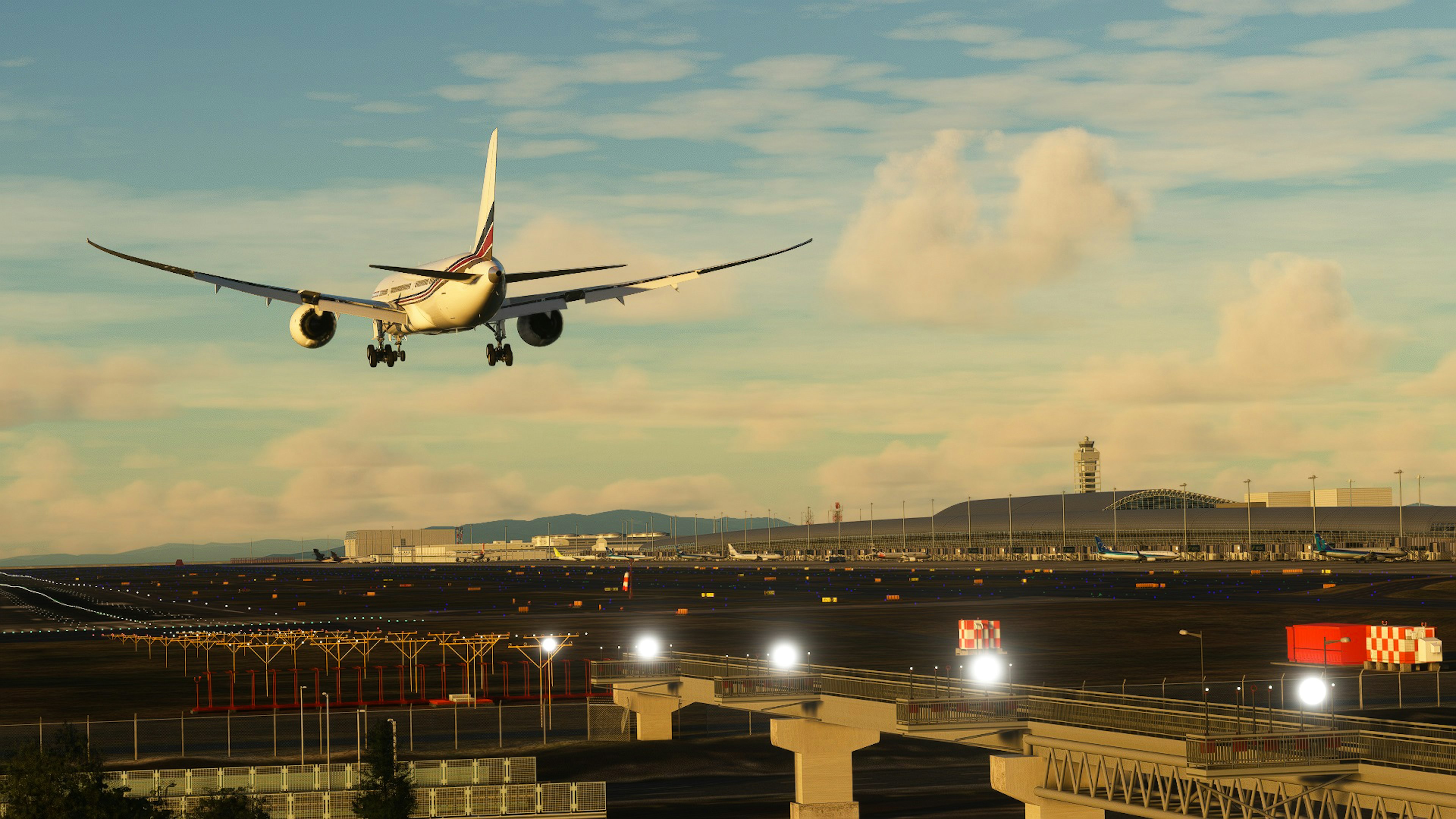 Passenger plane landing at an airport with a beautiful sunset backdrop