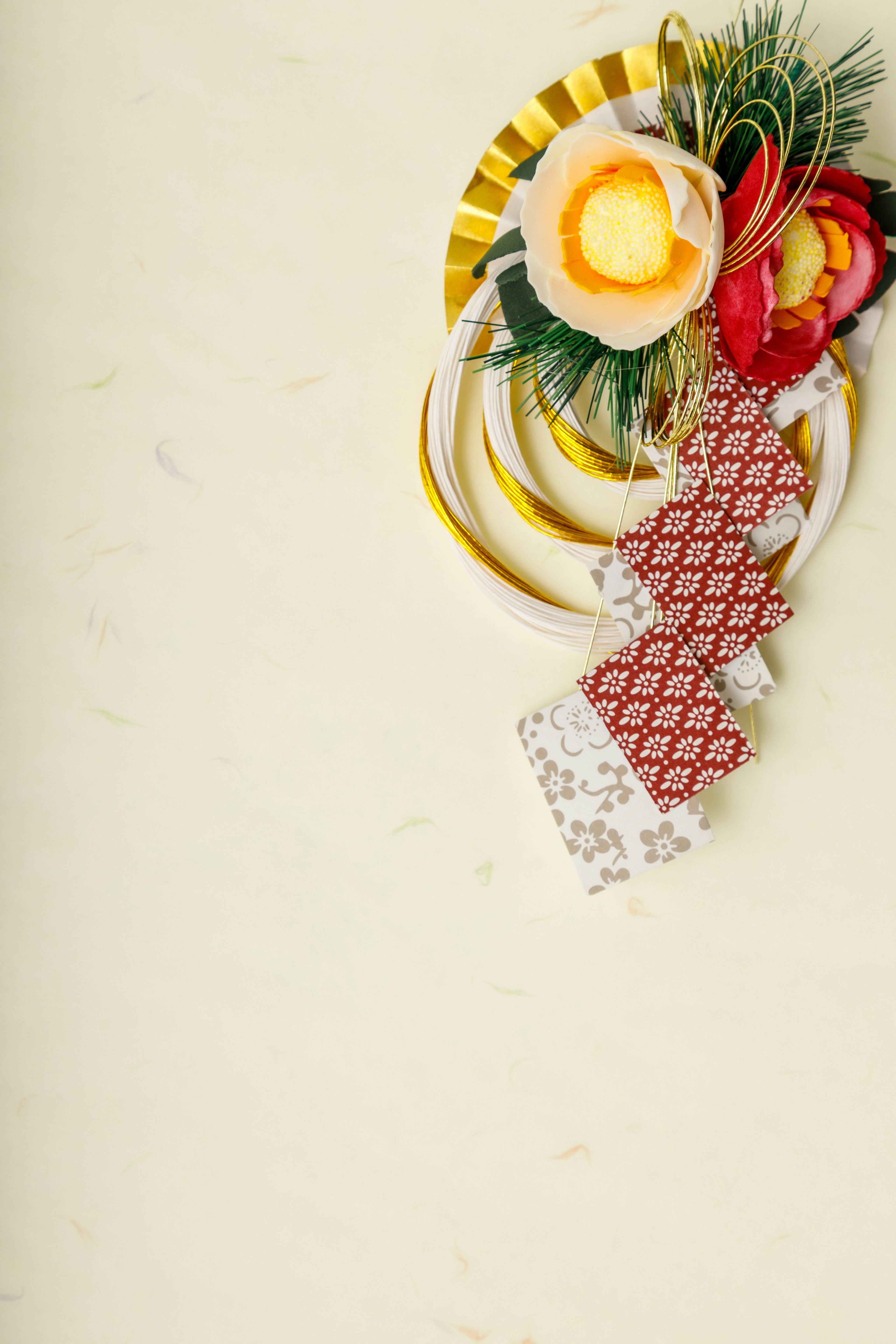 Traditional Japanese New Year decoration featuring colorful flowers and ribbons