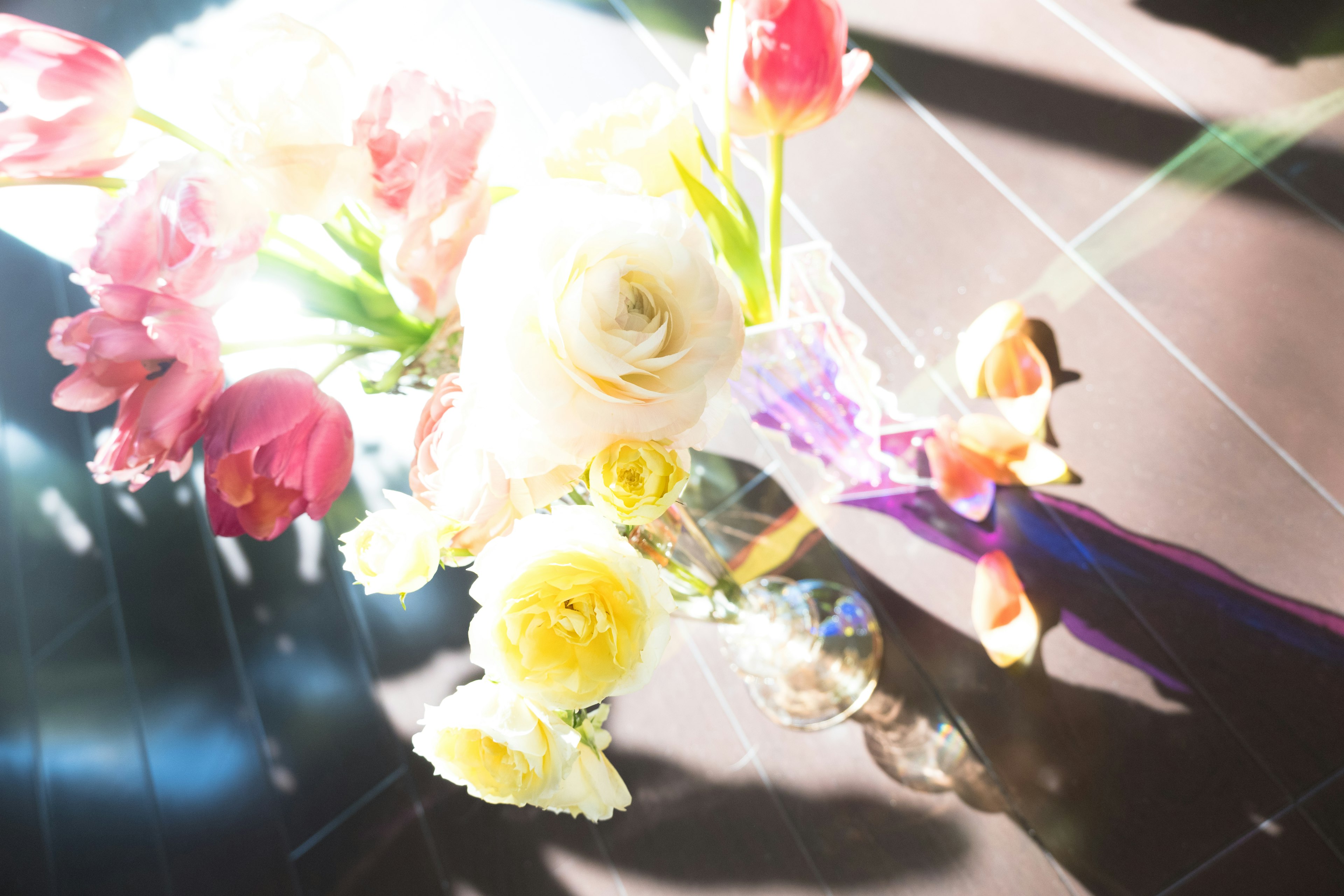 A vibrant bouquet of mixed flowers in a vase