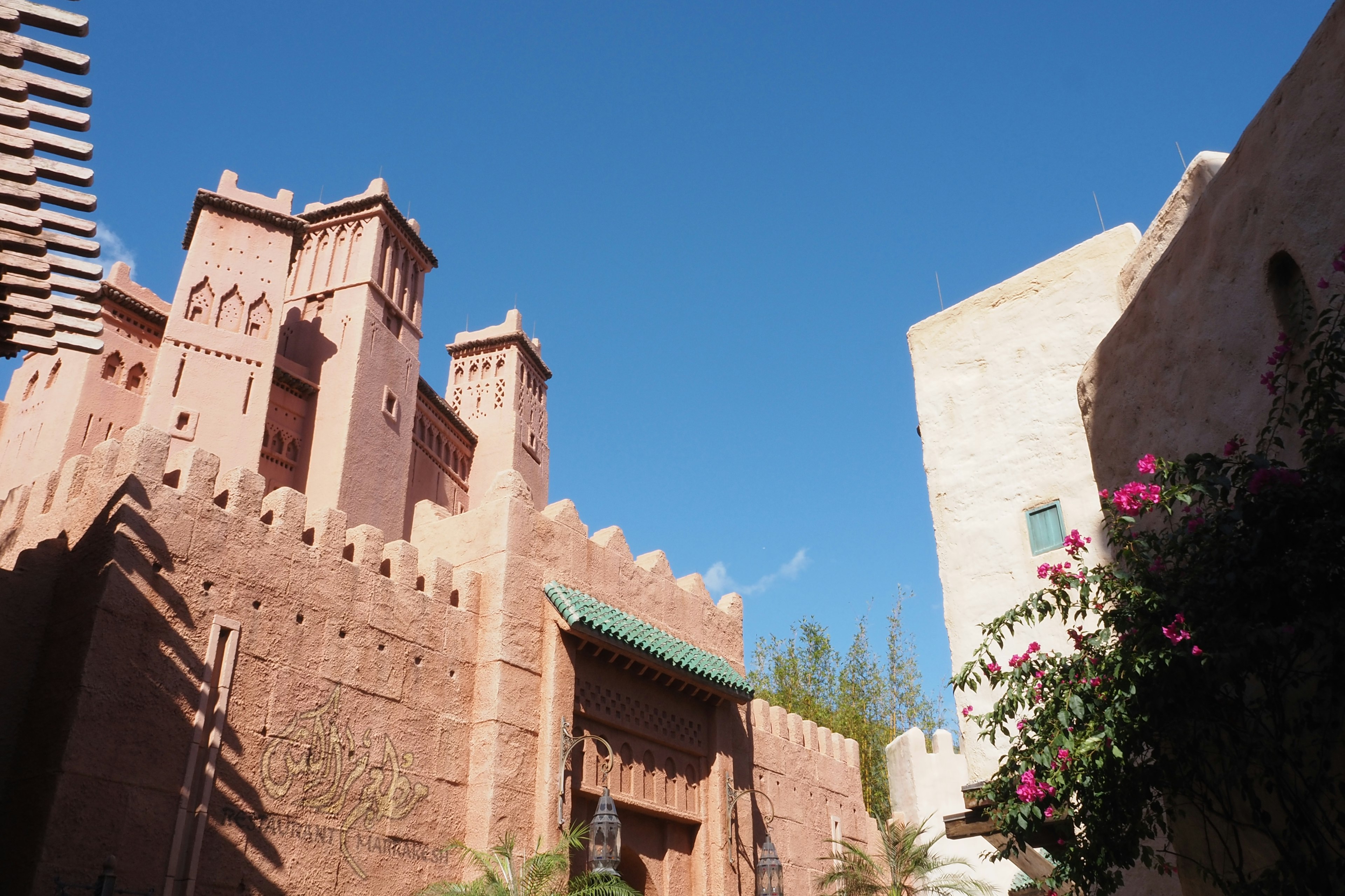 Traditional Moroccan buildings and walls under a blue sky