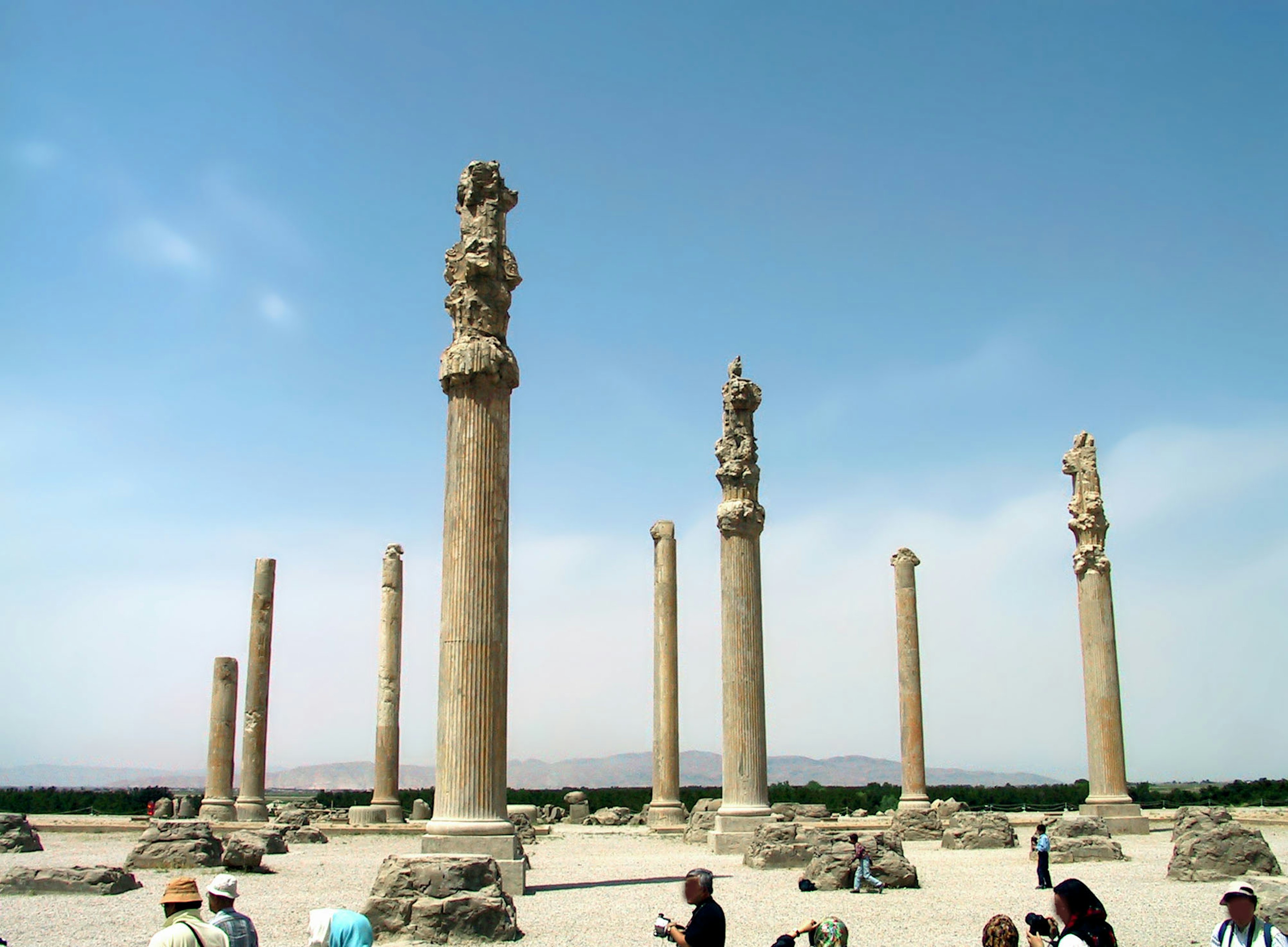 Ruins of Persepolis featuring columns and sculptures