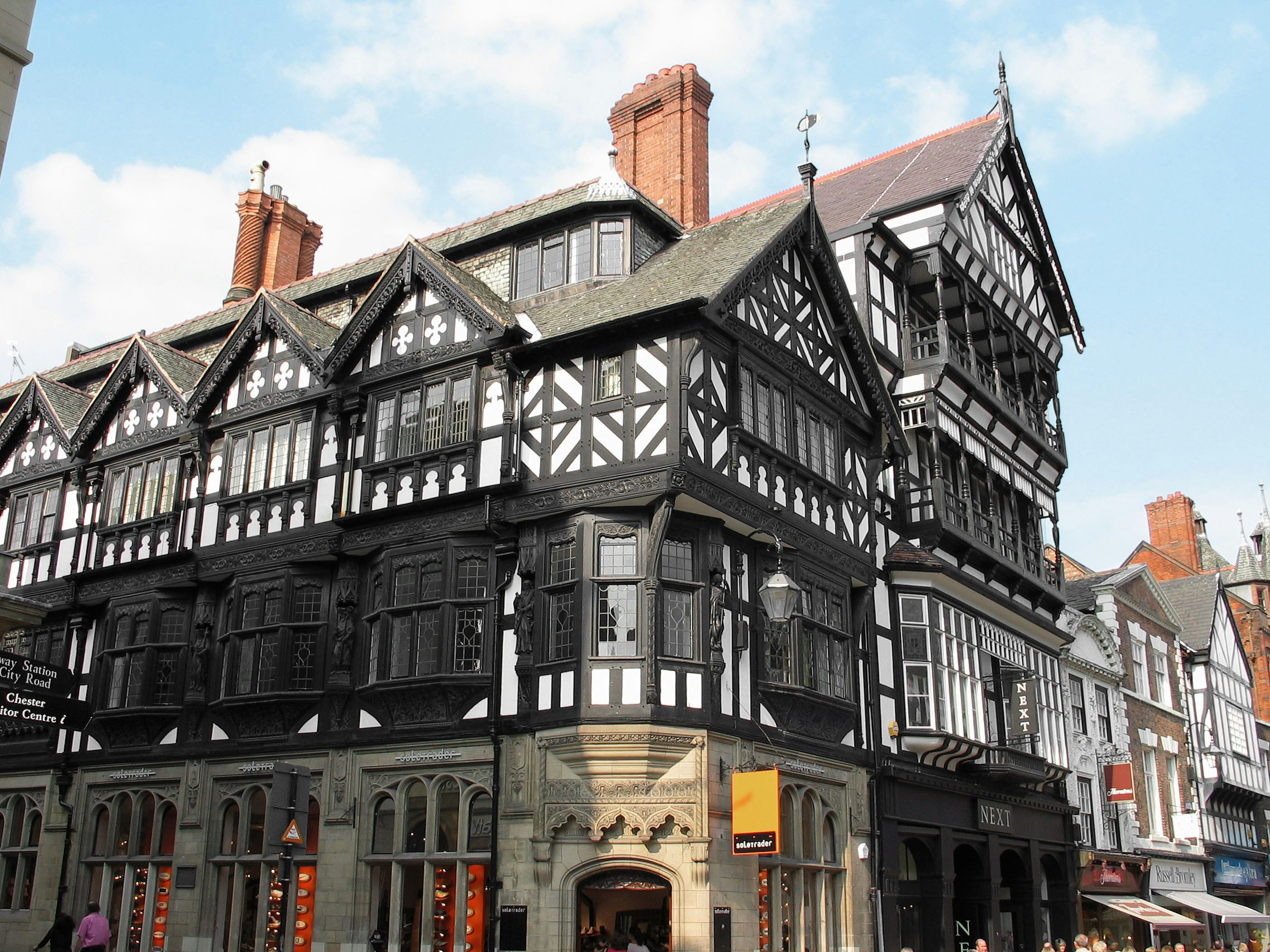 Black and white timber-framed building with intricate architecture