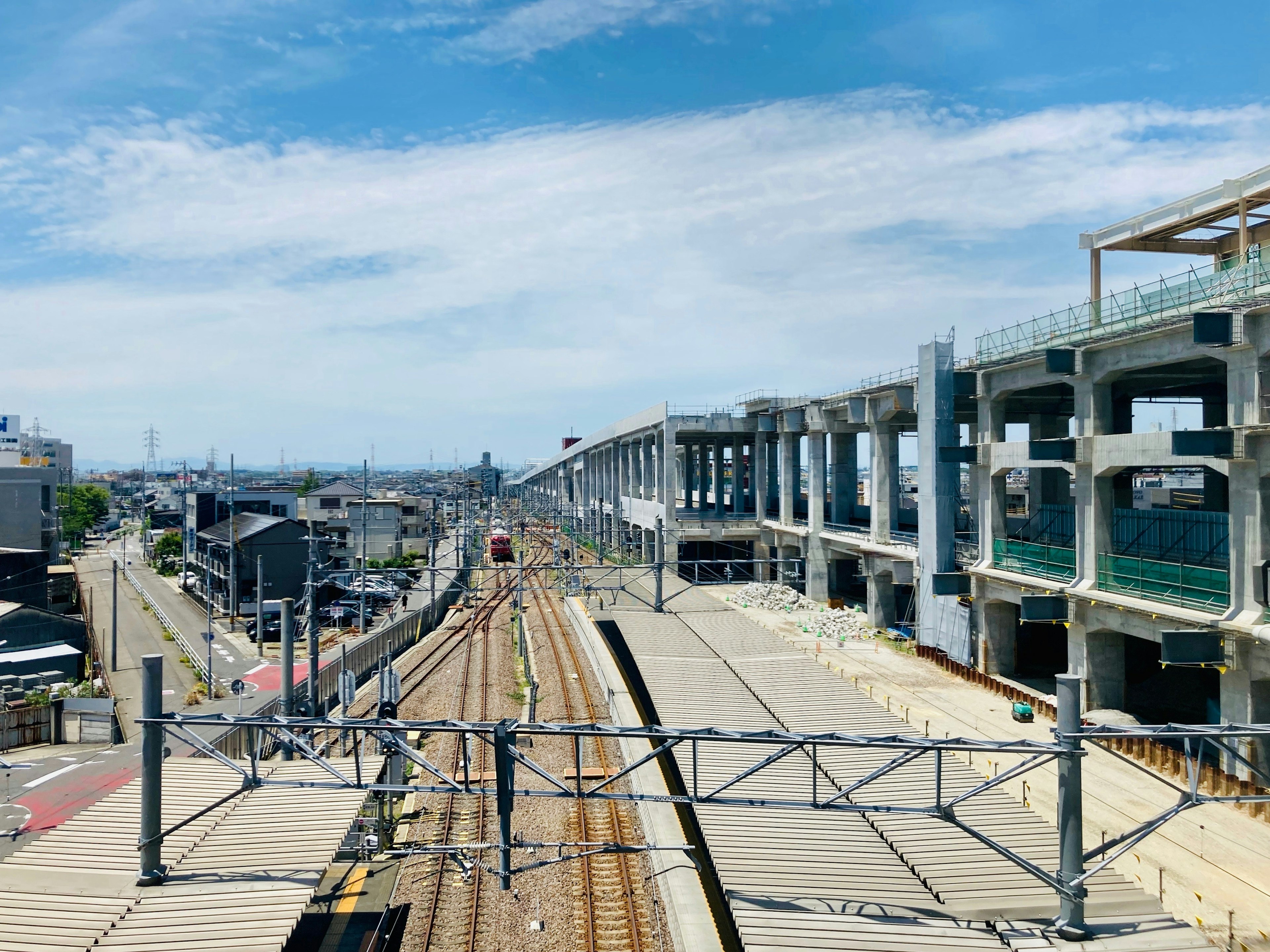 View of a railway station under construction with blue sky