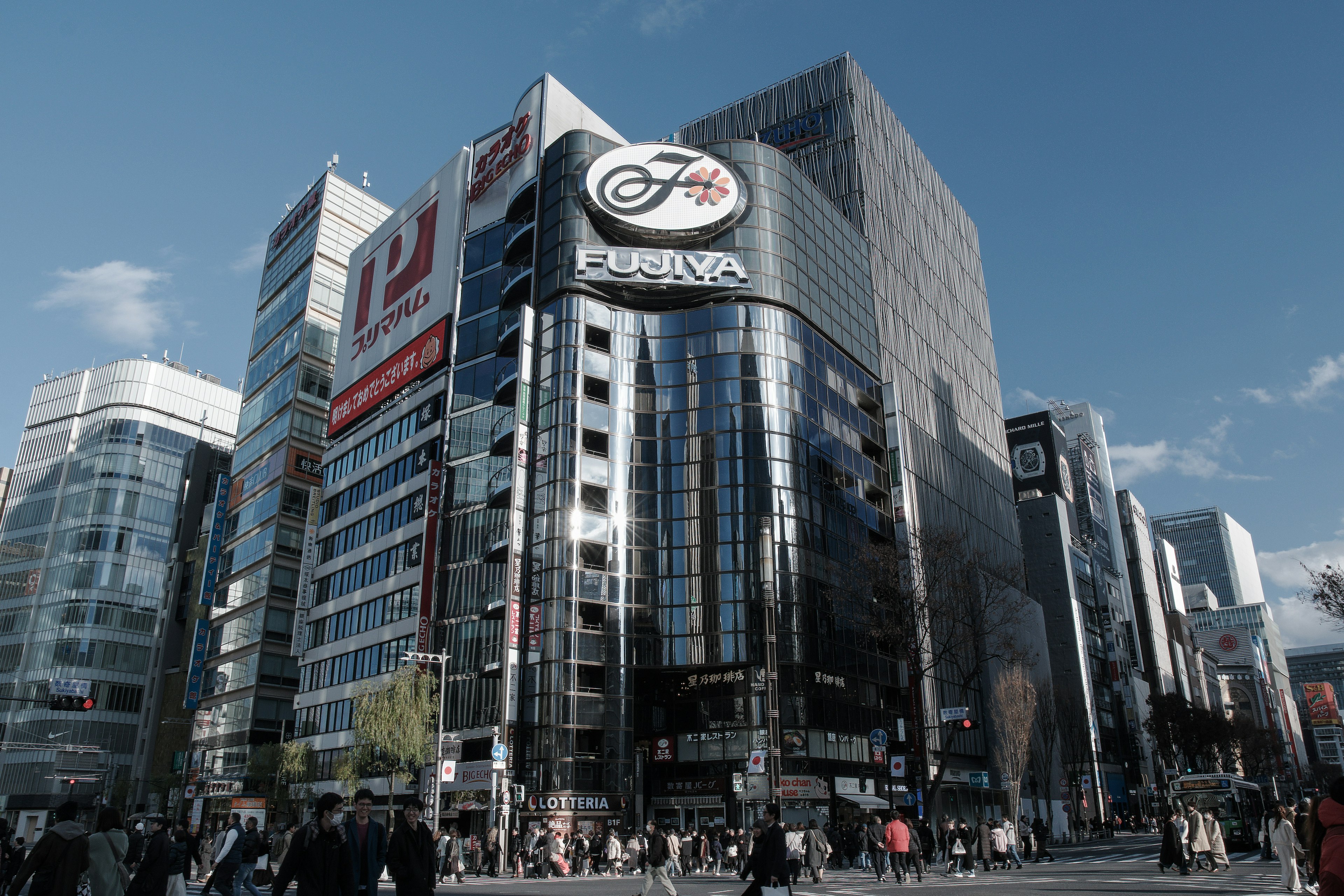 Modern buildings in Ginza with bustling crowds