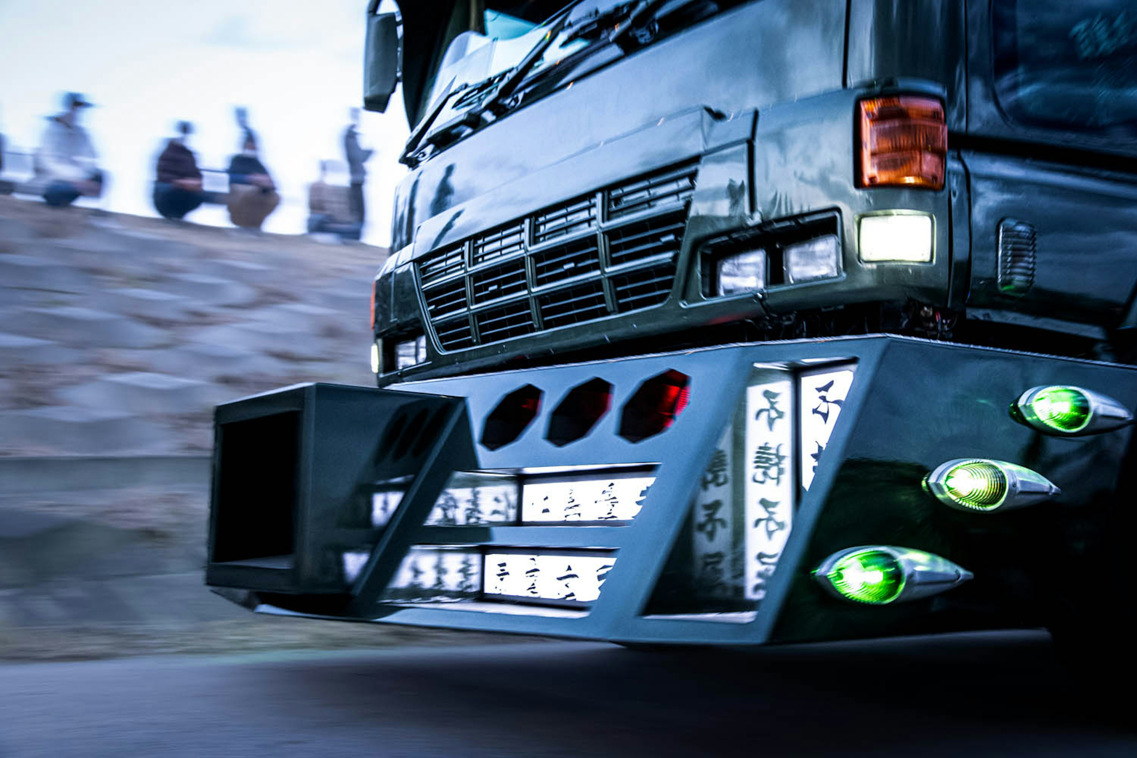 Detailed view of a custom truck front with unique lights