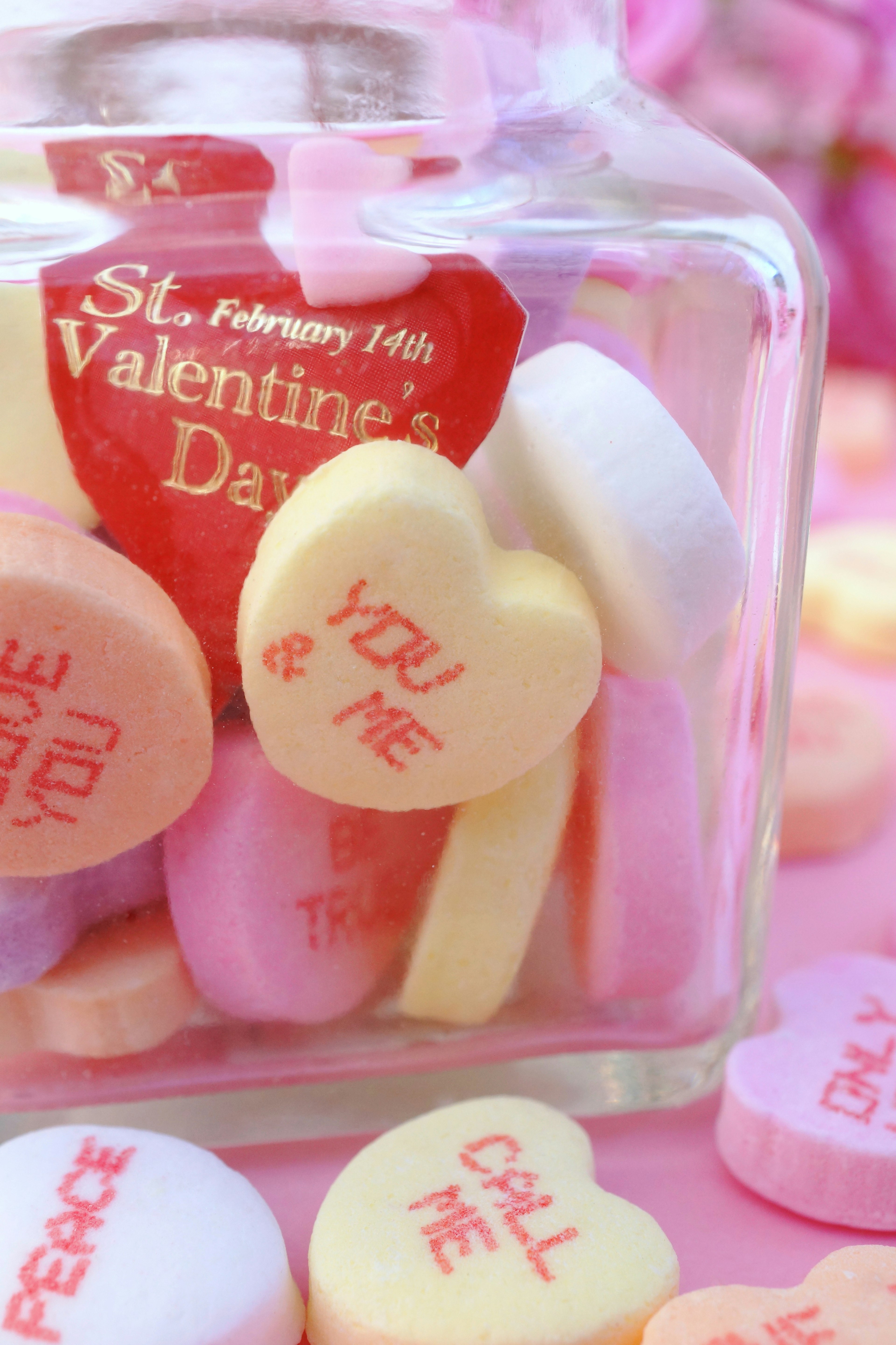 Jar filled with heart-shaped candies for Valentine's Day