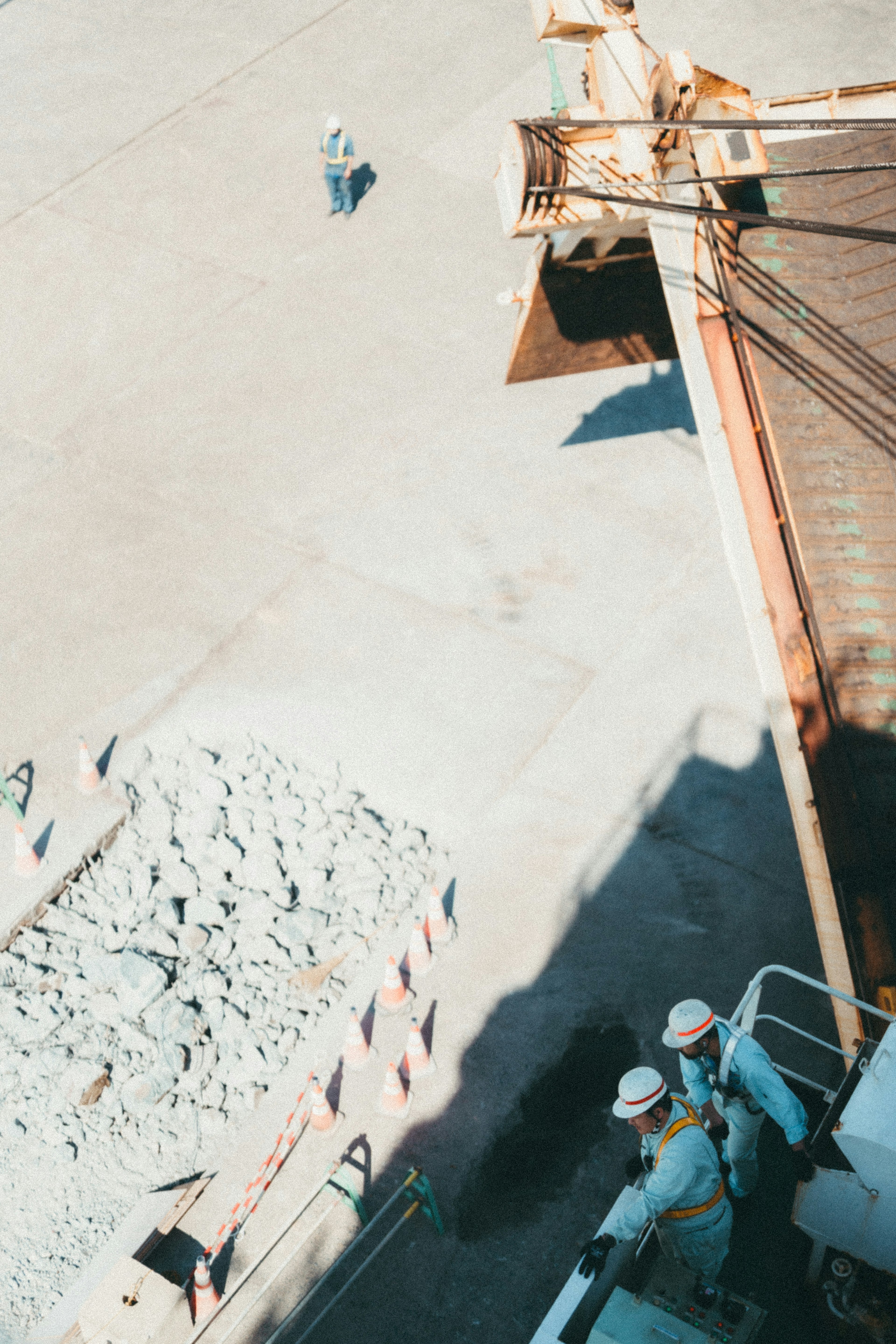 Construction site with workers and heavy machinery