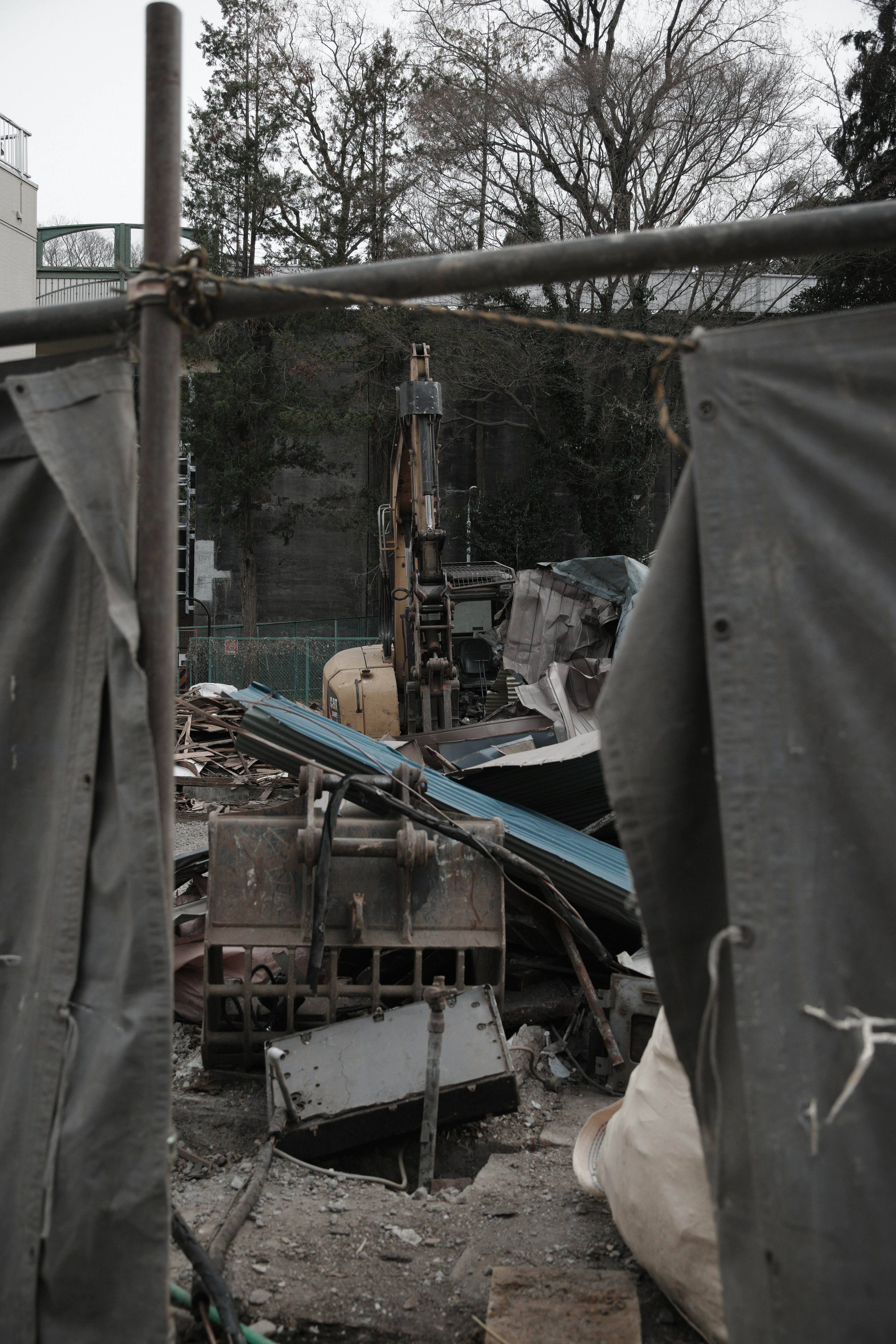 Construction site with scattered debris and machinery