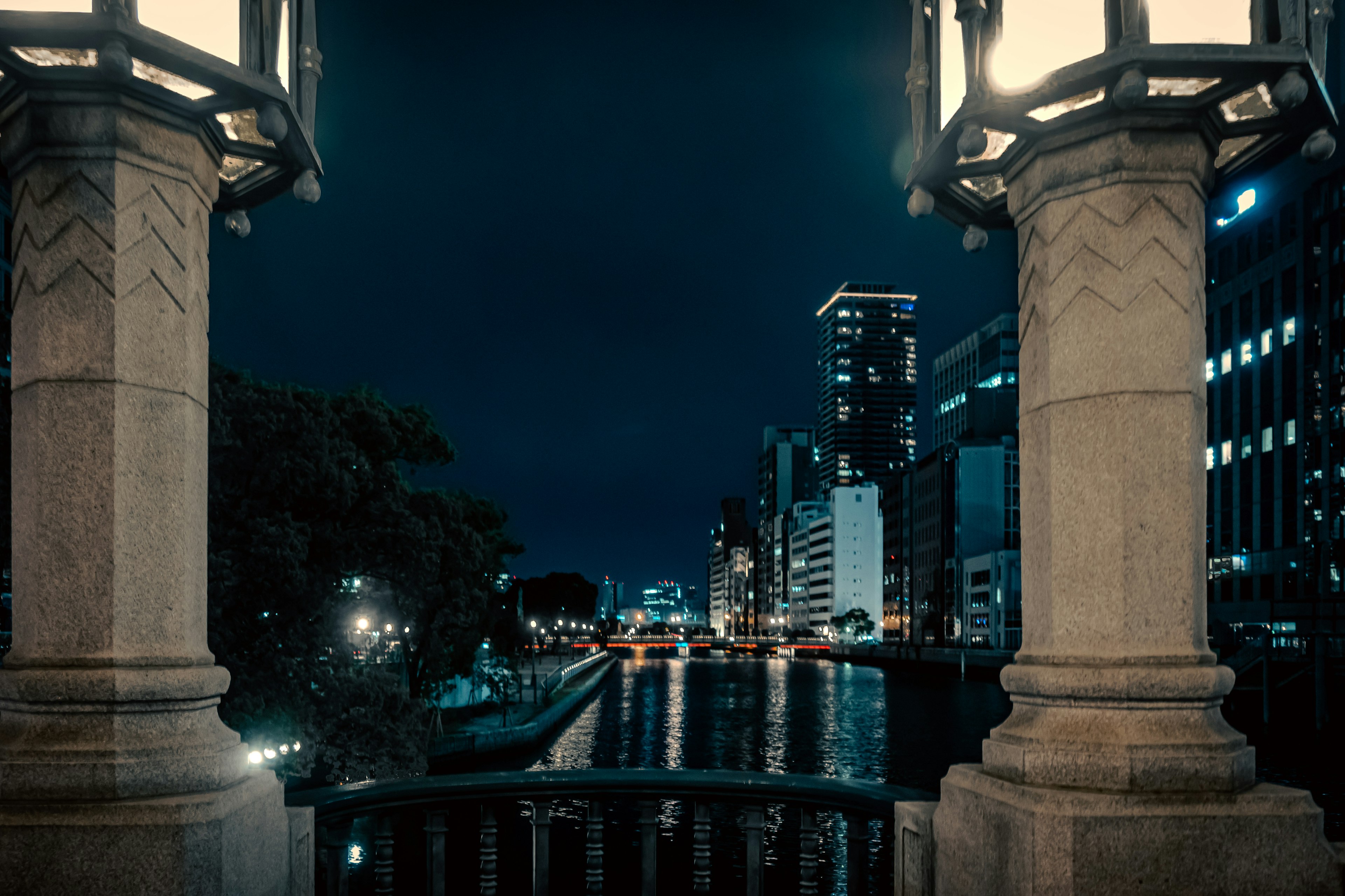 Night view of Tokyo riverside with lamps and buildings