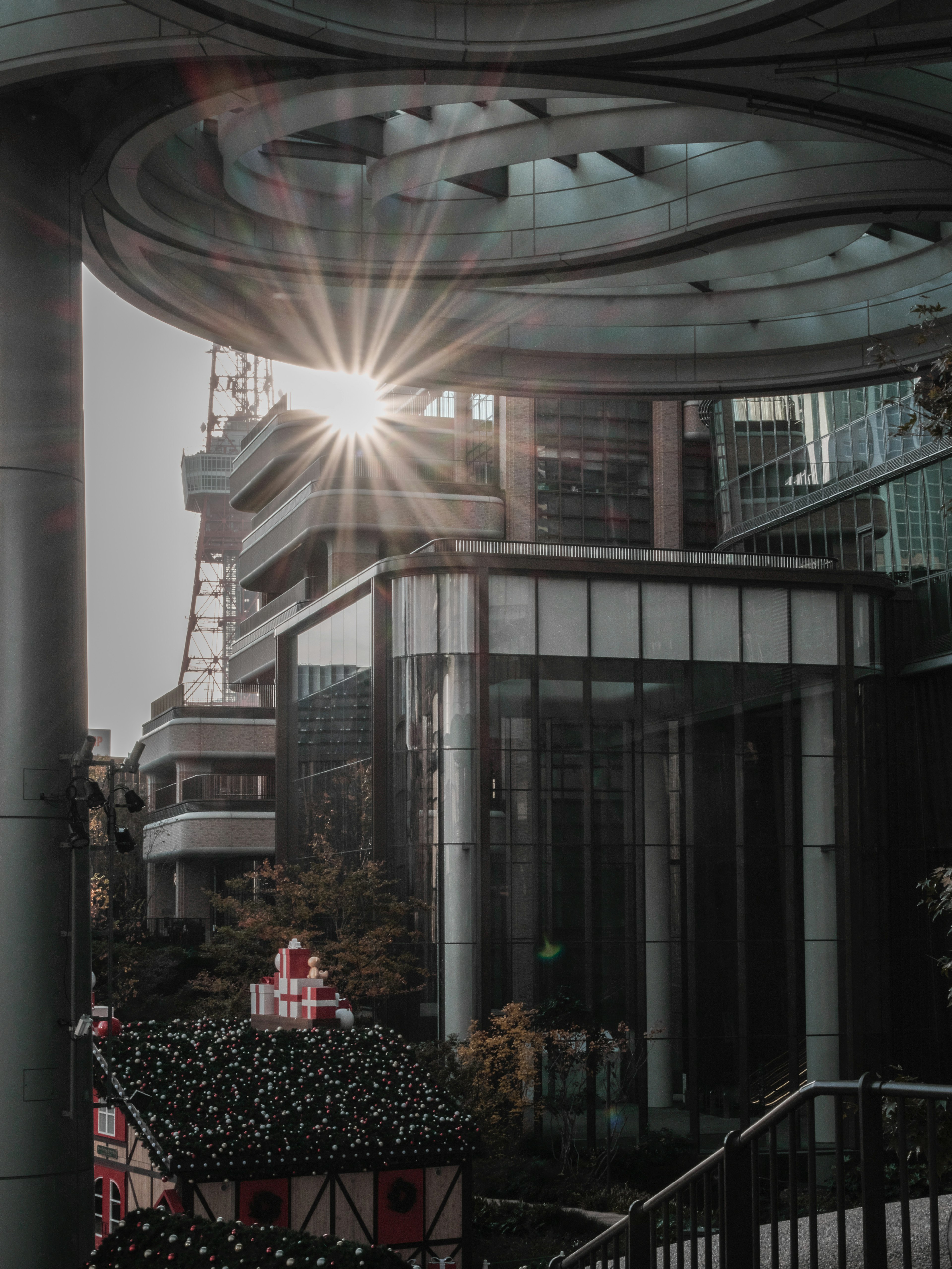 Urban landscape featuring buildings and sunlight reflection