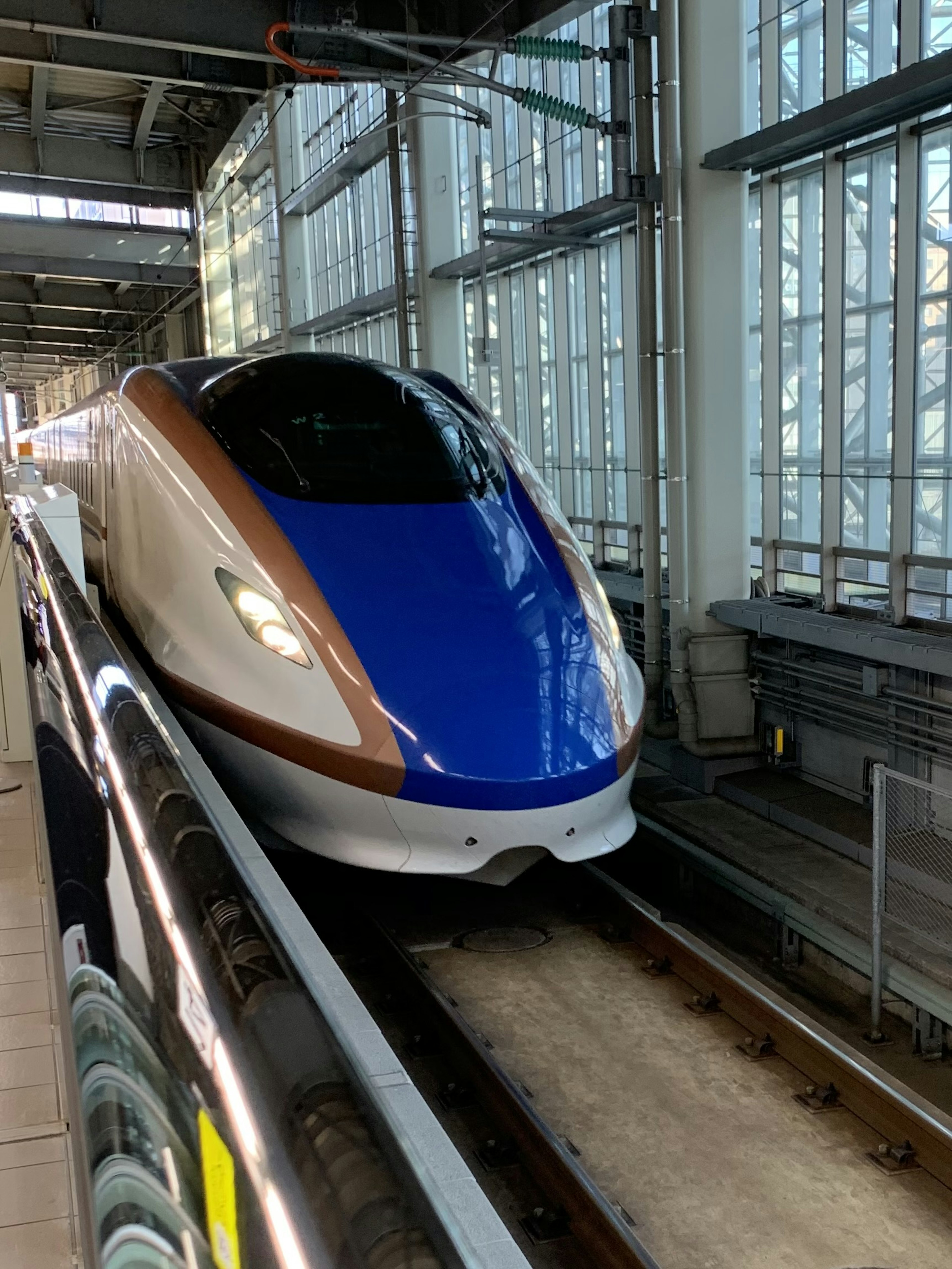 Shinkansen bullet train at a station platform