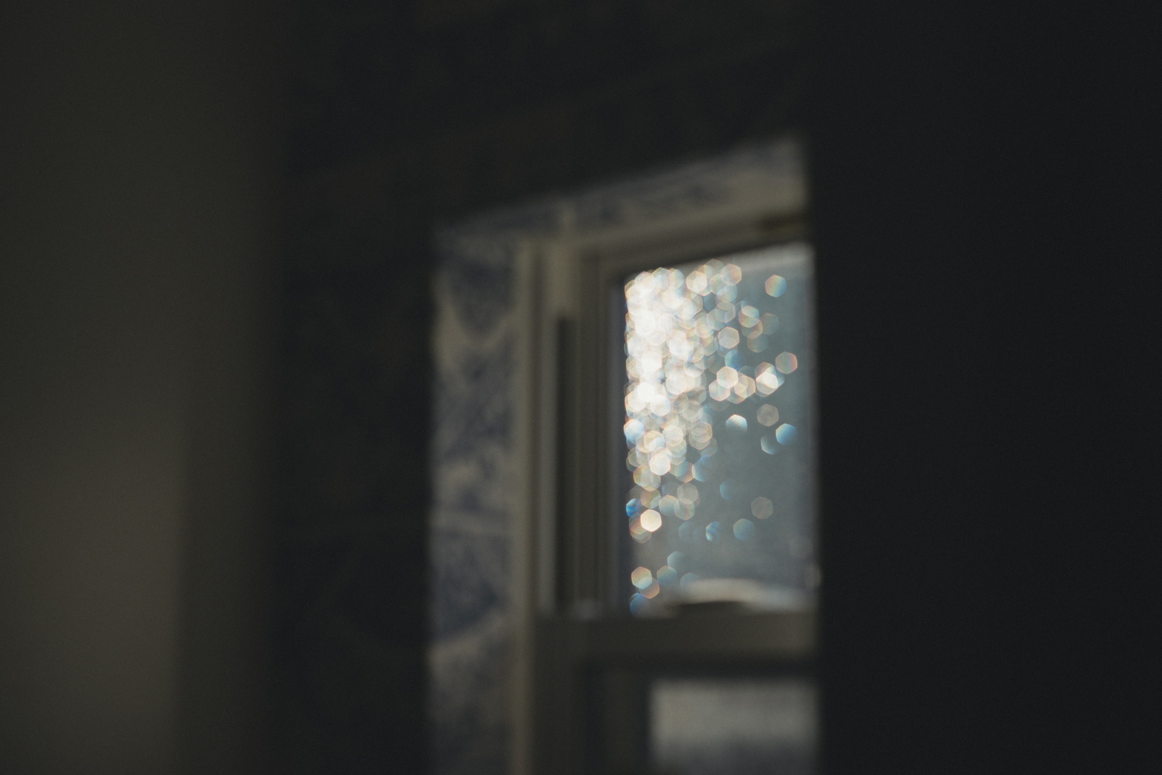 Soft light streaming through a window with a blurred background