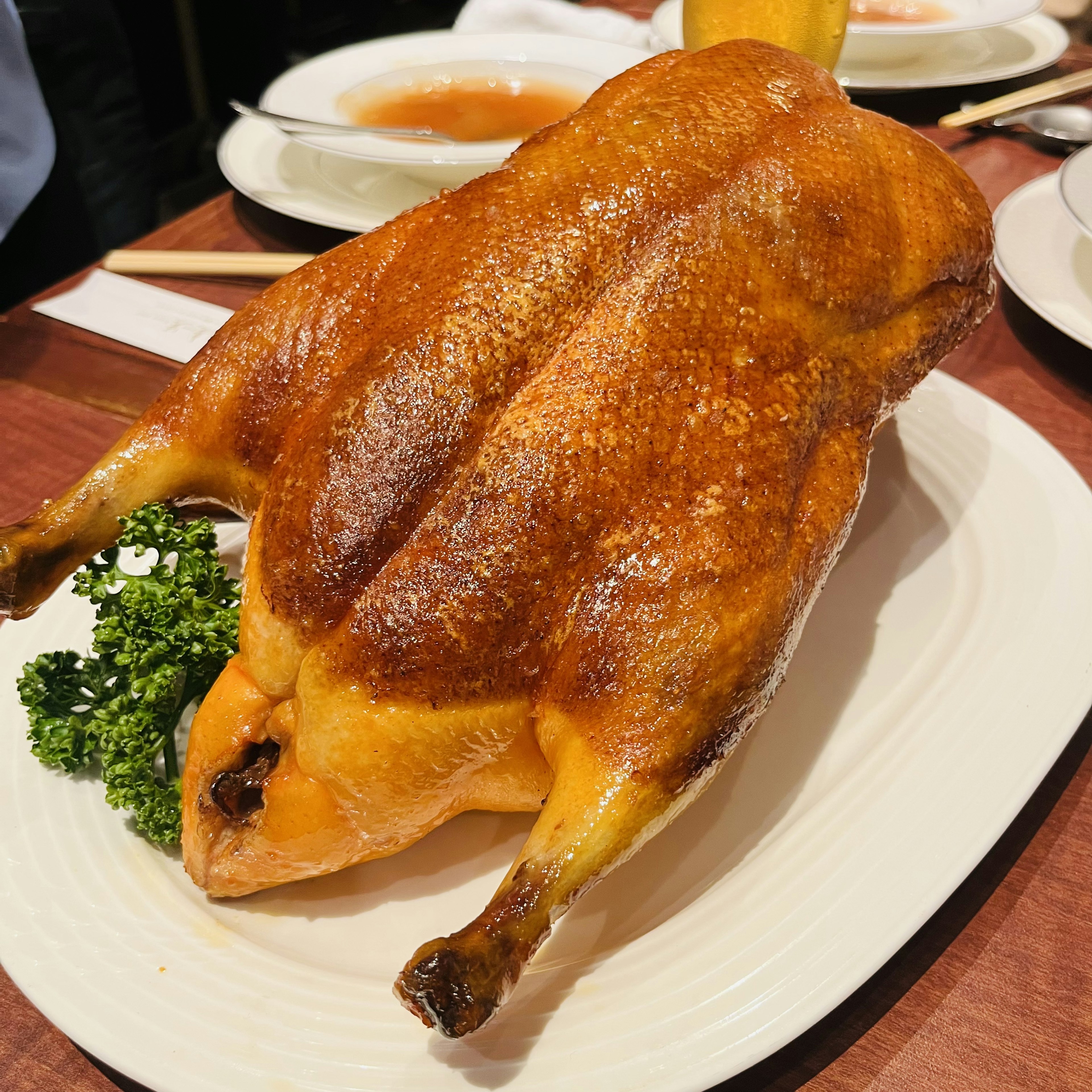 Golden roasted chicken presented on a plate