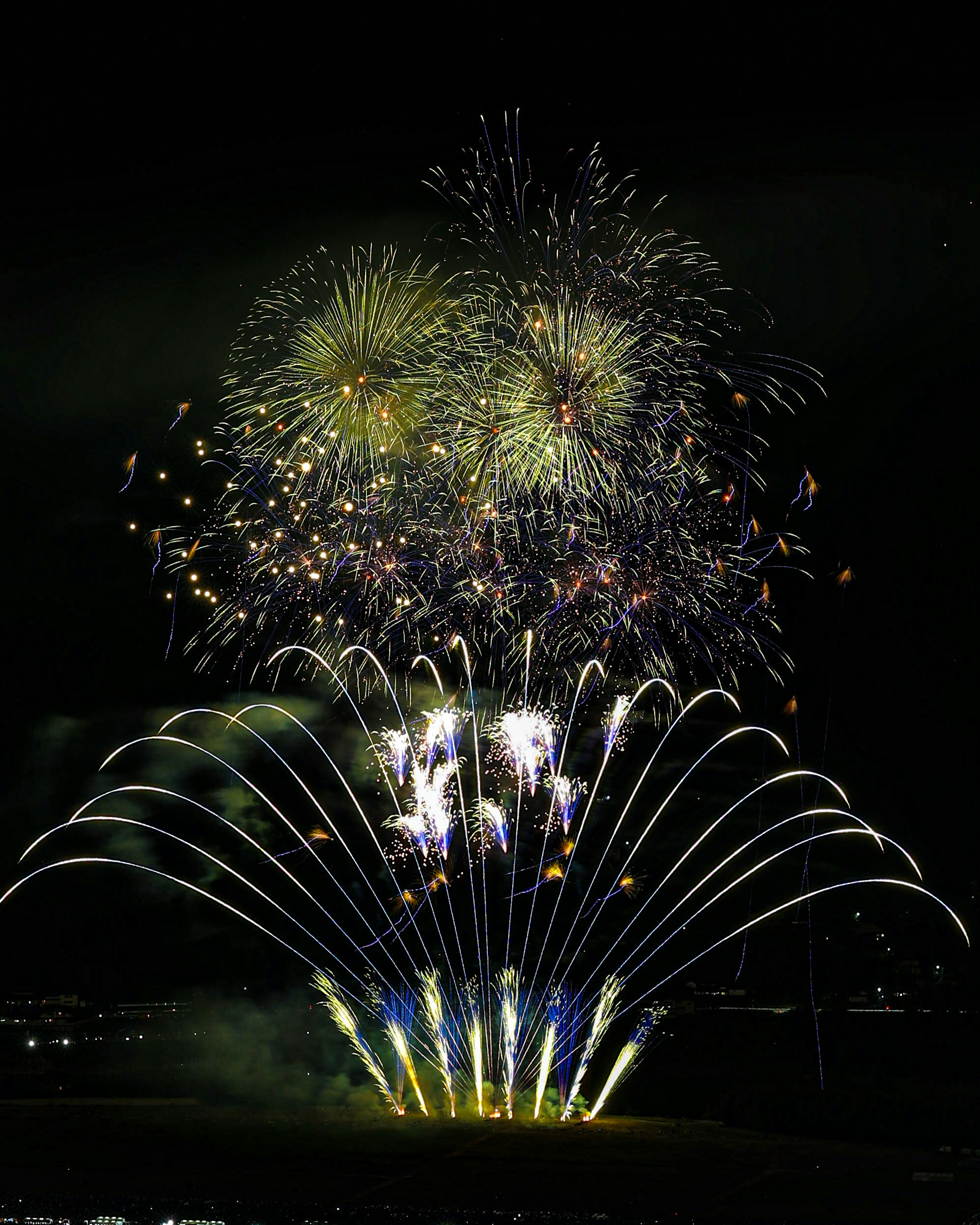 Colorful fireworks display bursting in the night sky