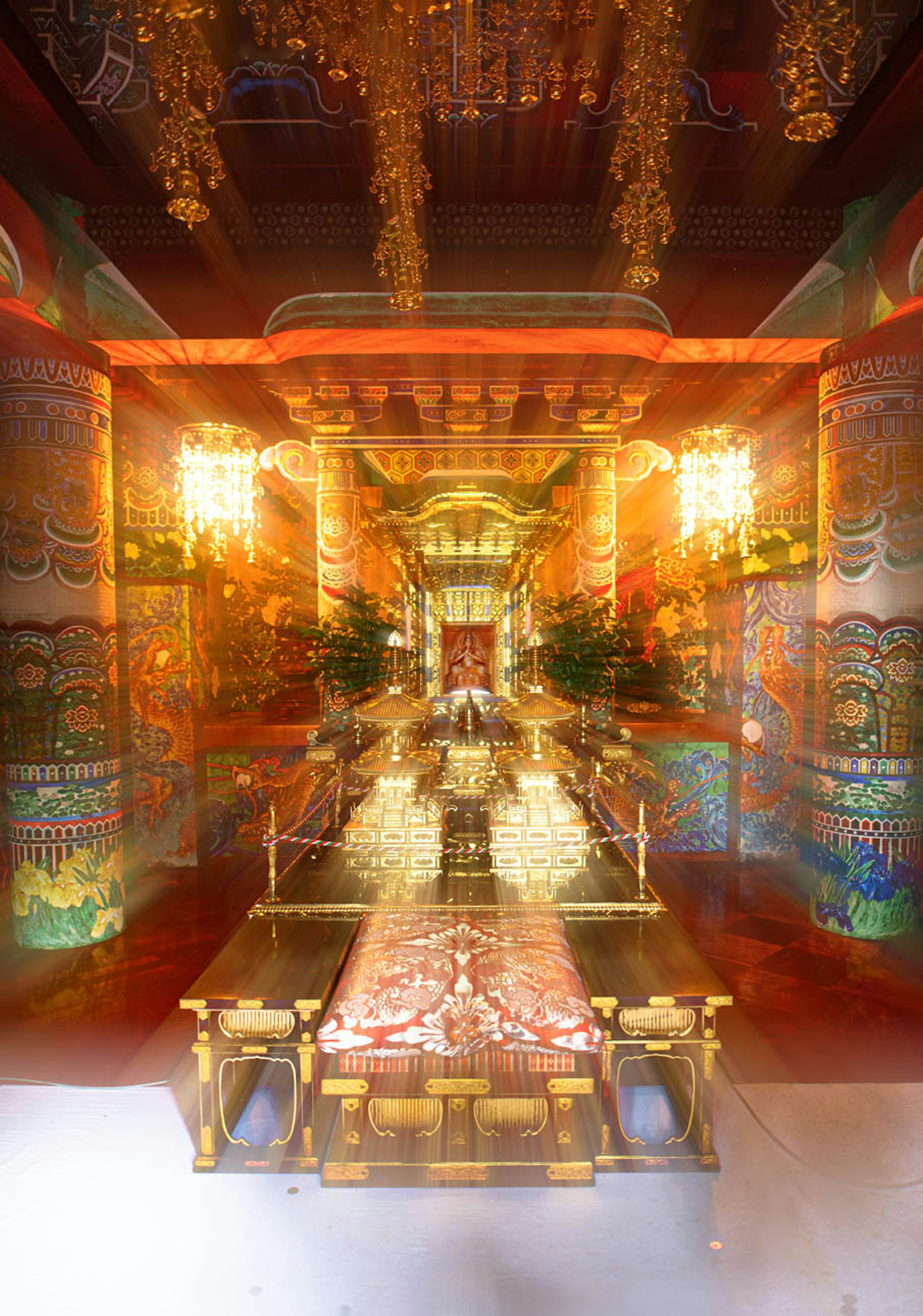 Luxurious interior of a temple with a golden altar and beautiful murals