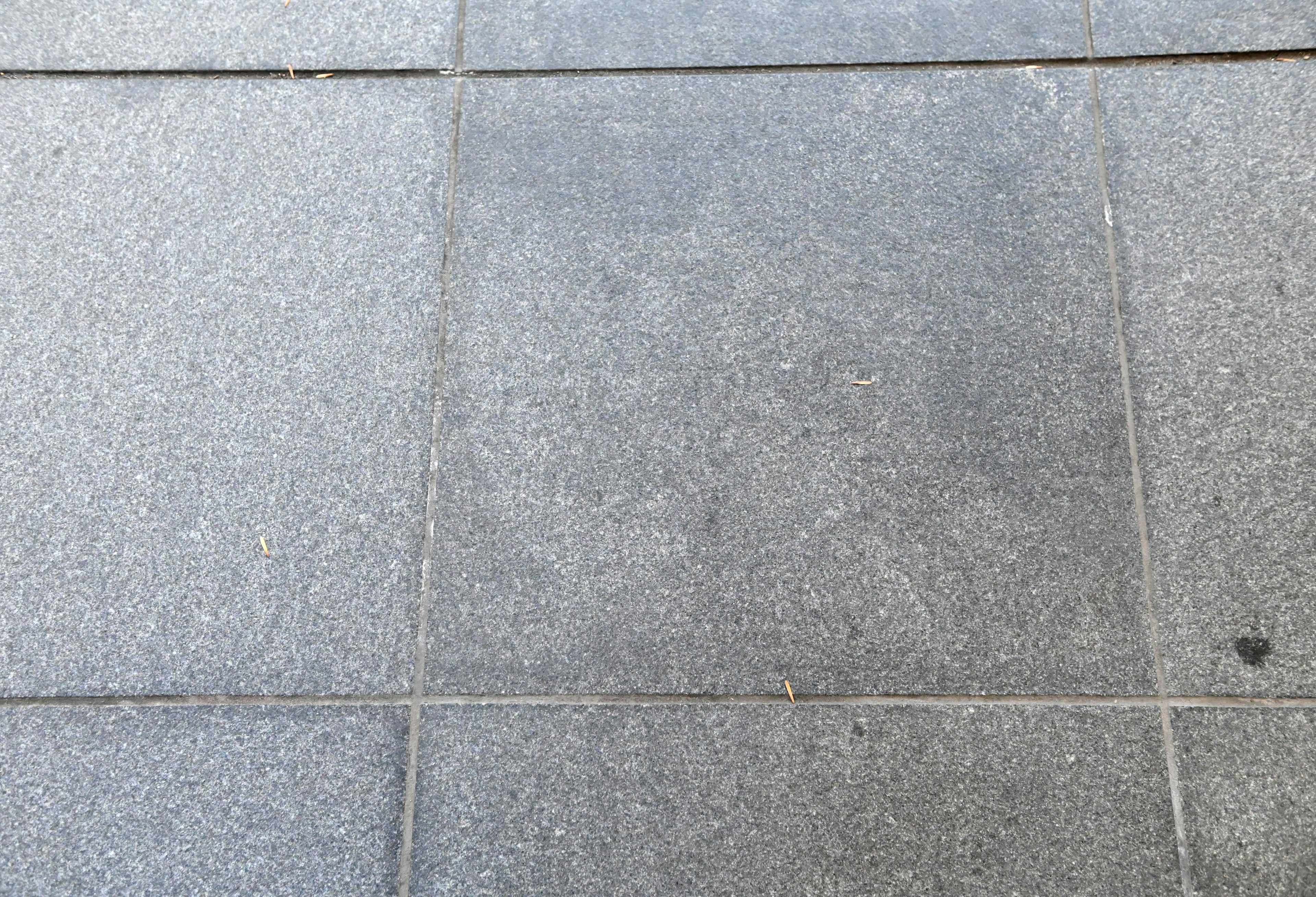 Image of gray tiled pavement with a smooth surface