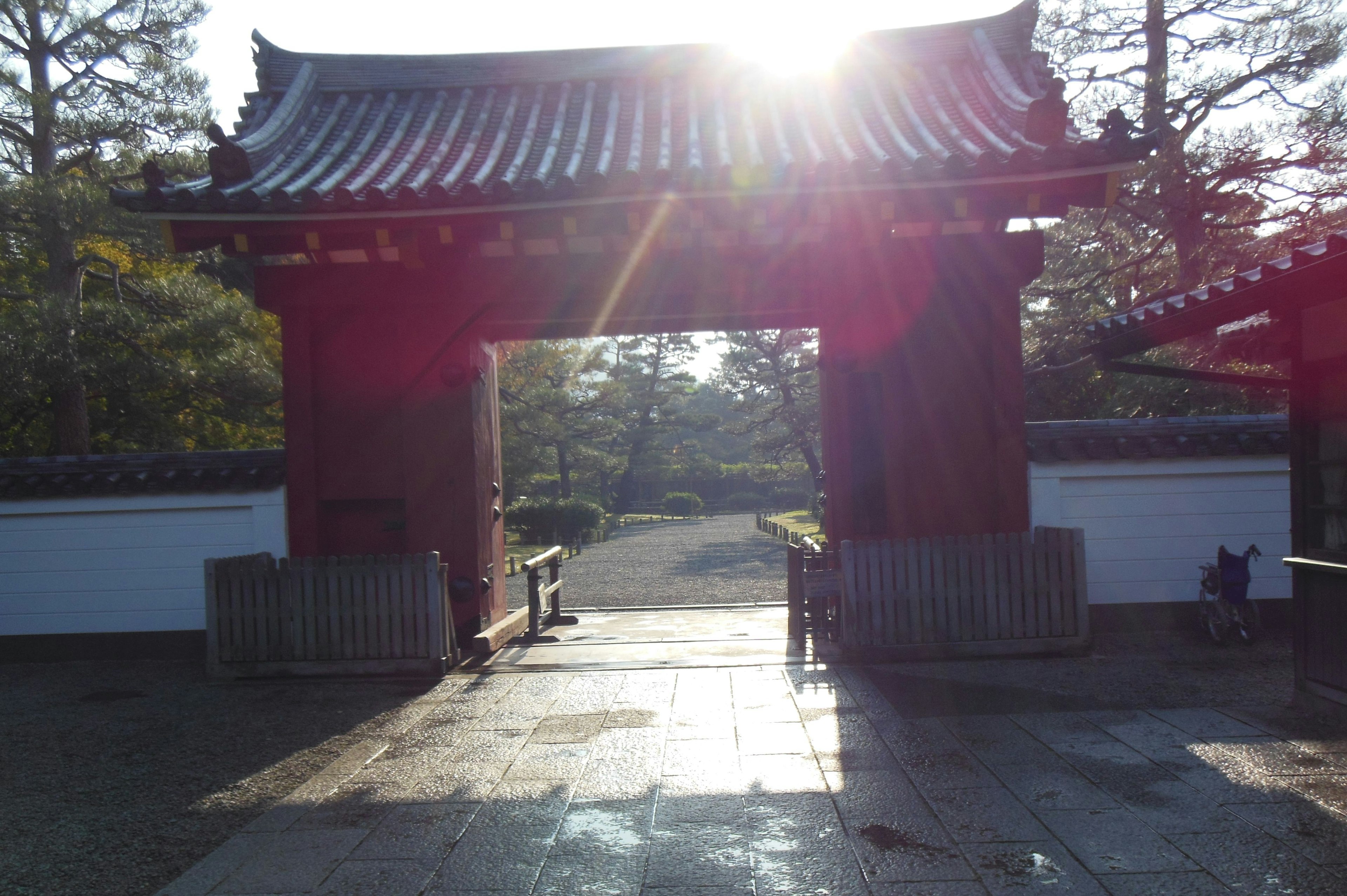 Traditional Japanese gate illuminated by sunlight