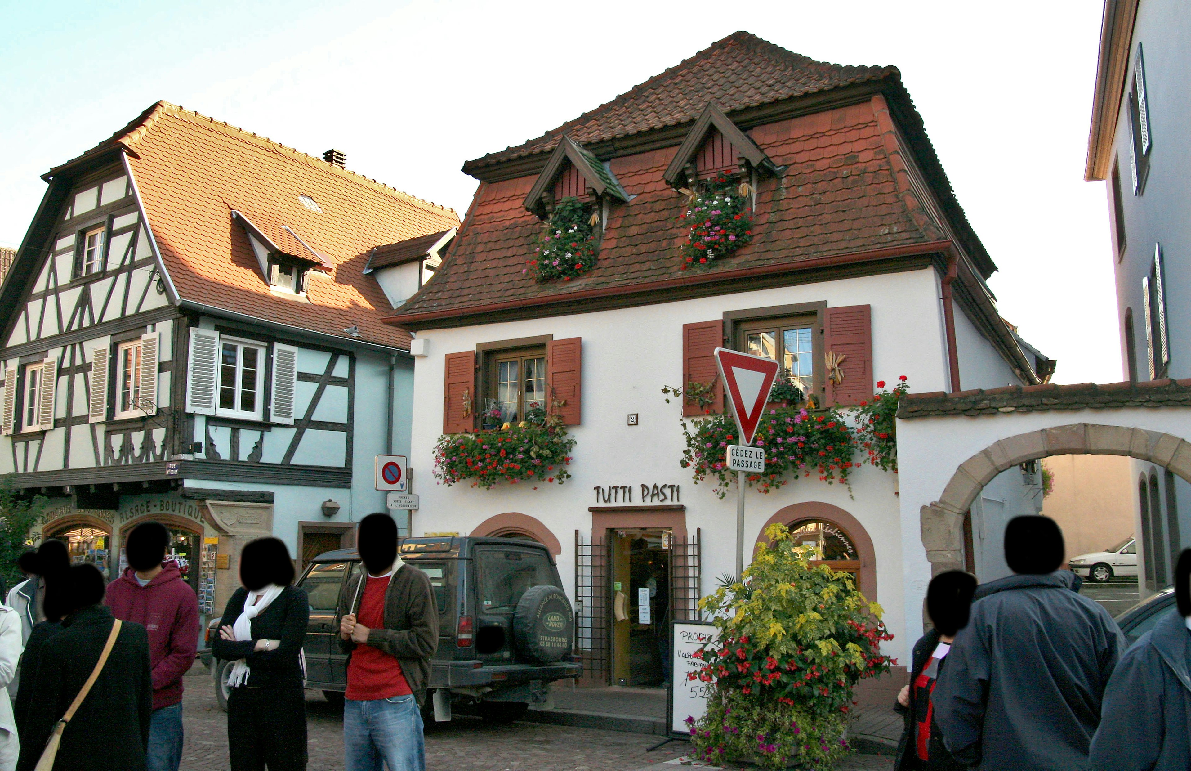 Traditional German building with tourists in the foreground