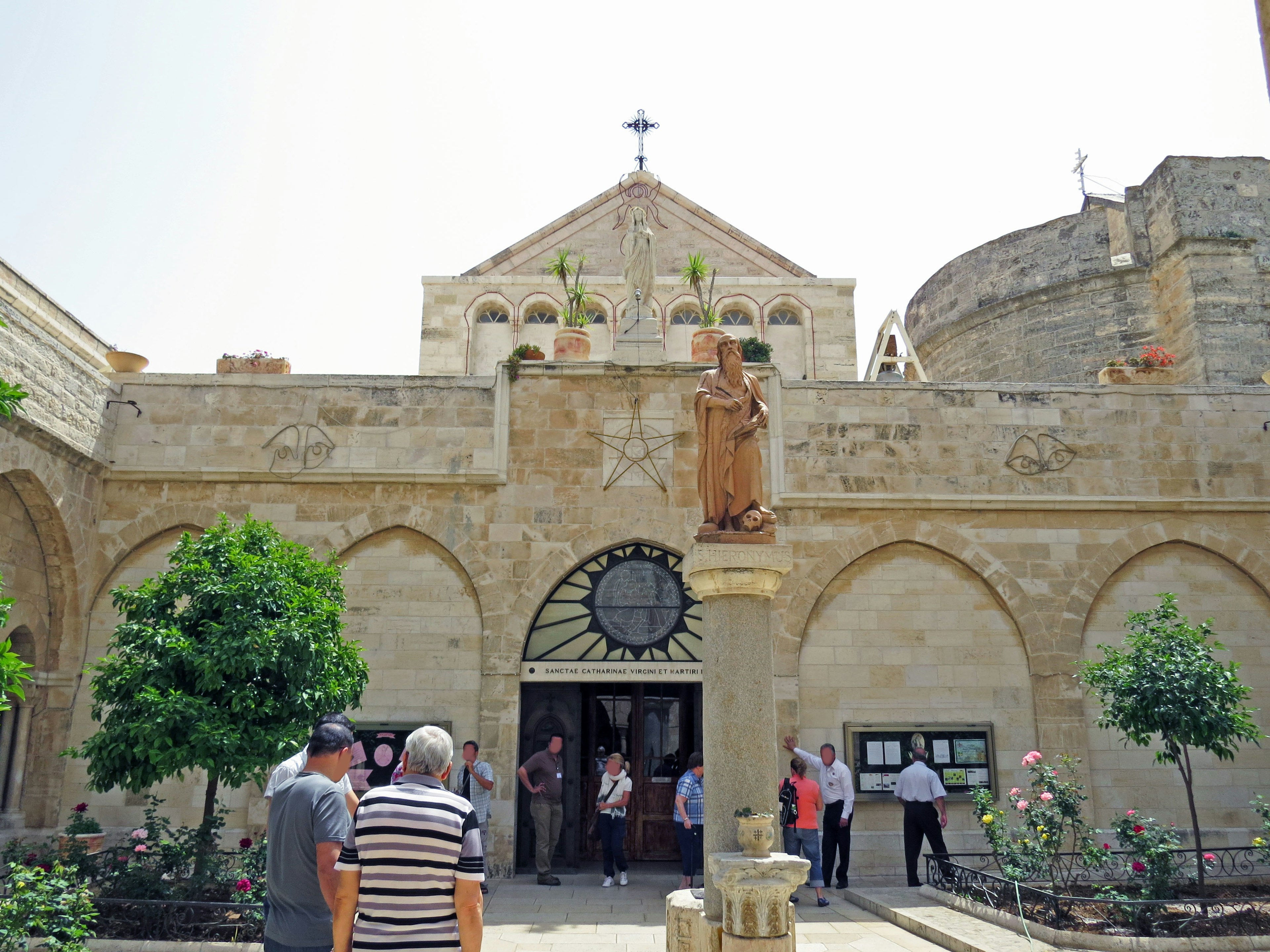 Historic church exterior with visitors