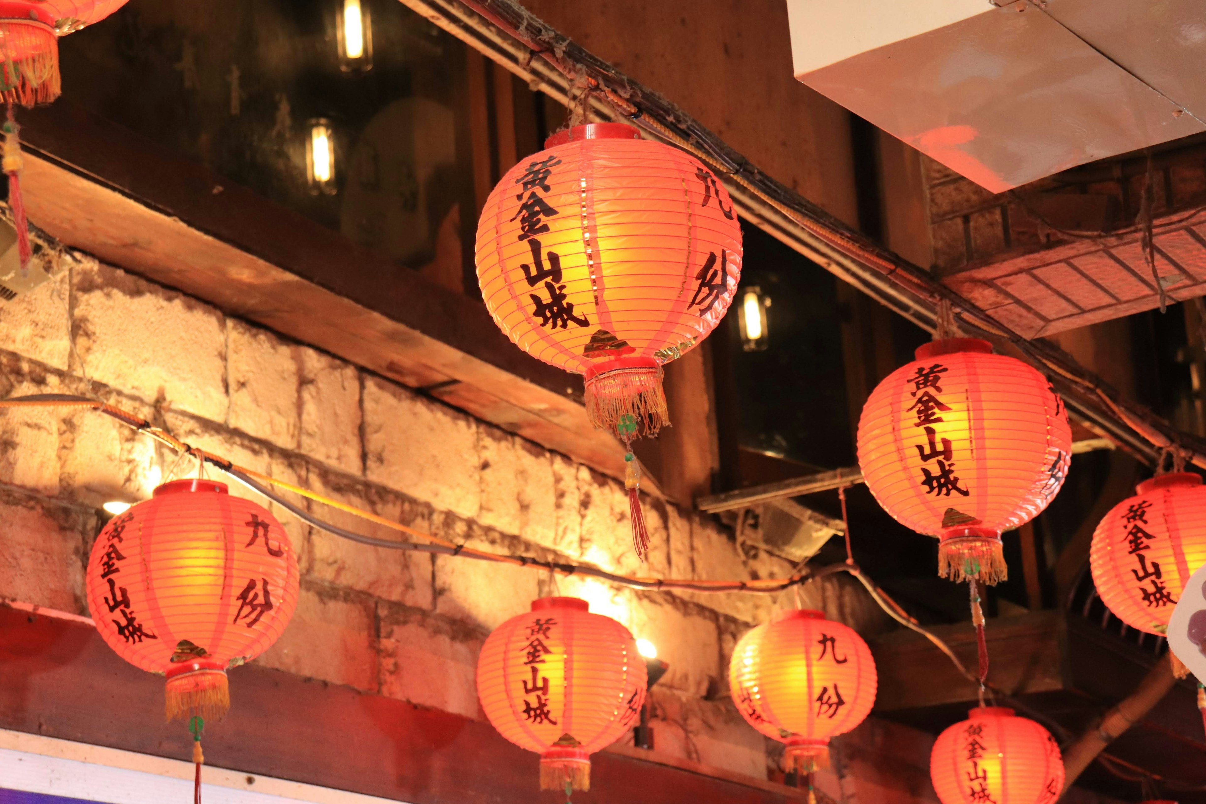 Warm street scene with red lanterns hanging