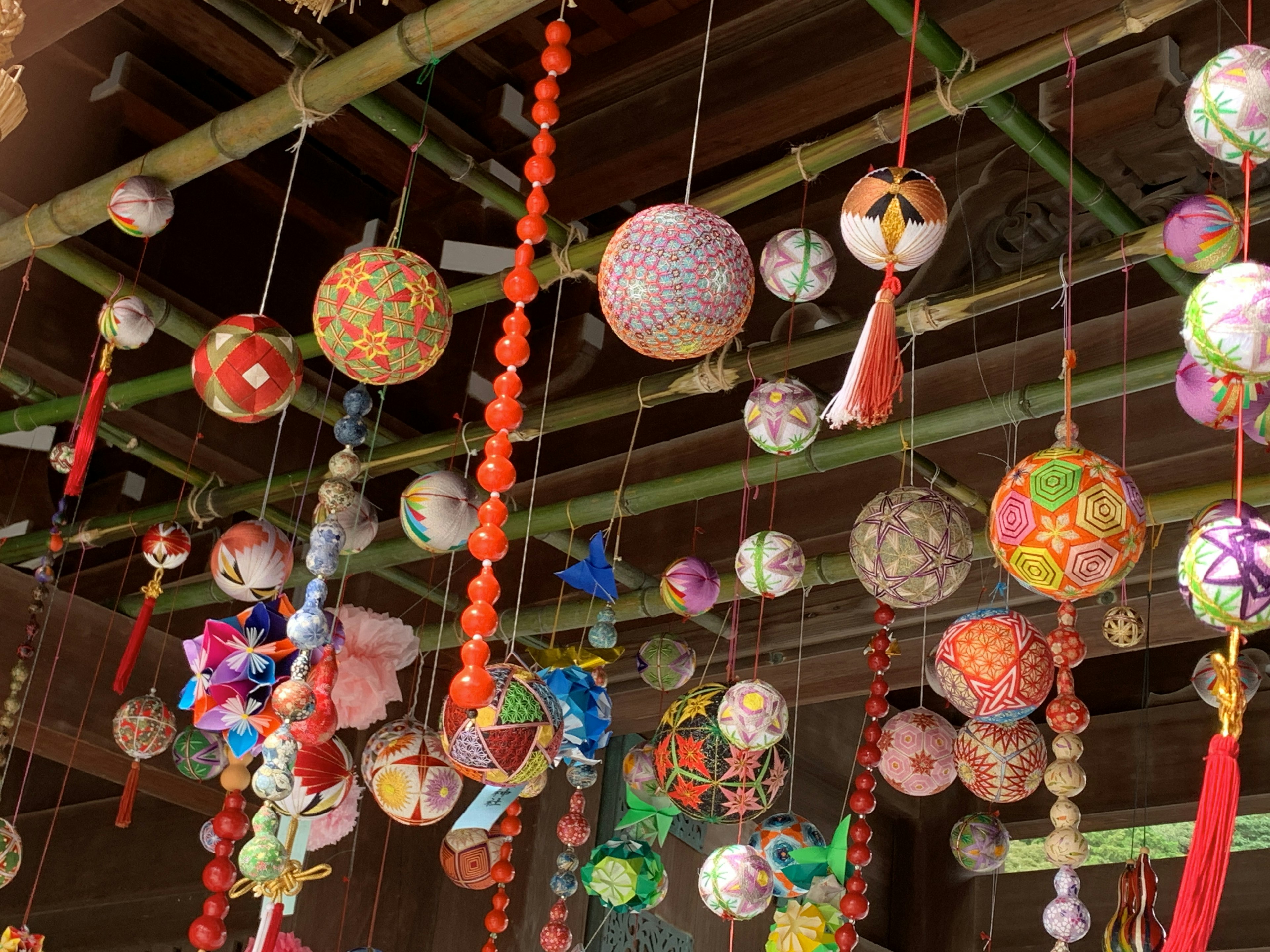 Colorful hanging decorations in various patterns and designs