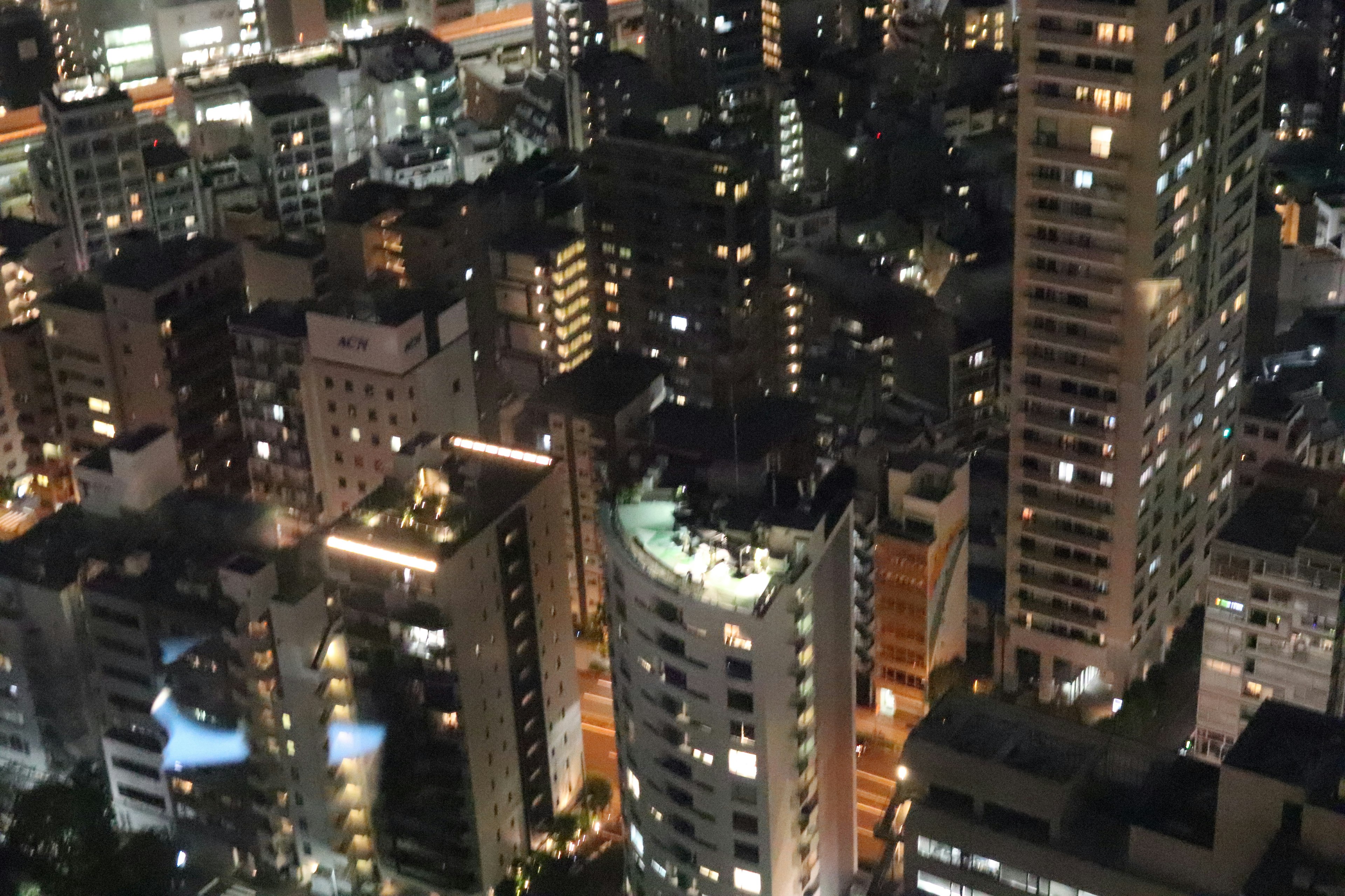 Night view of a cityscape with high-rise buildings