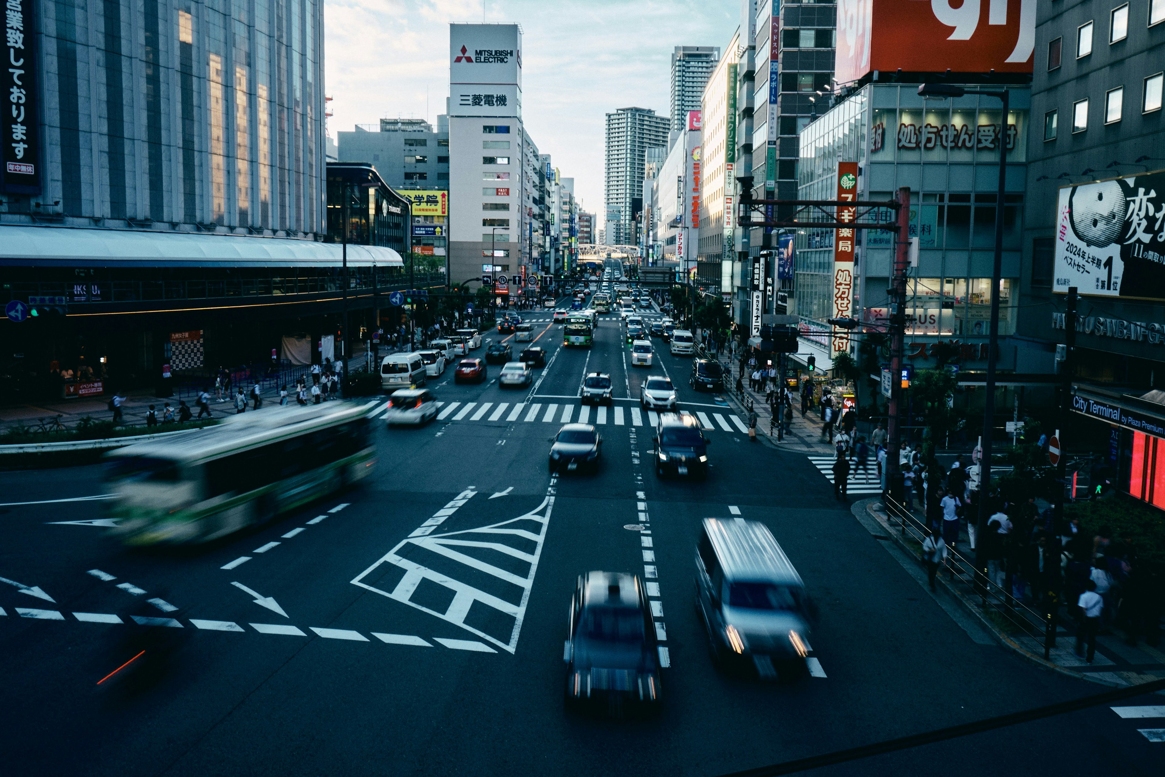 Busy urban intersection with moving vehicles