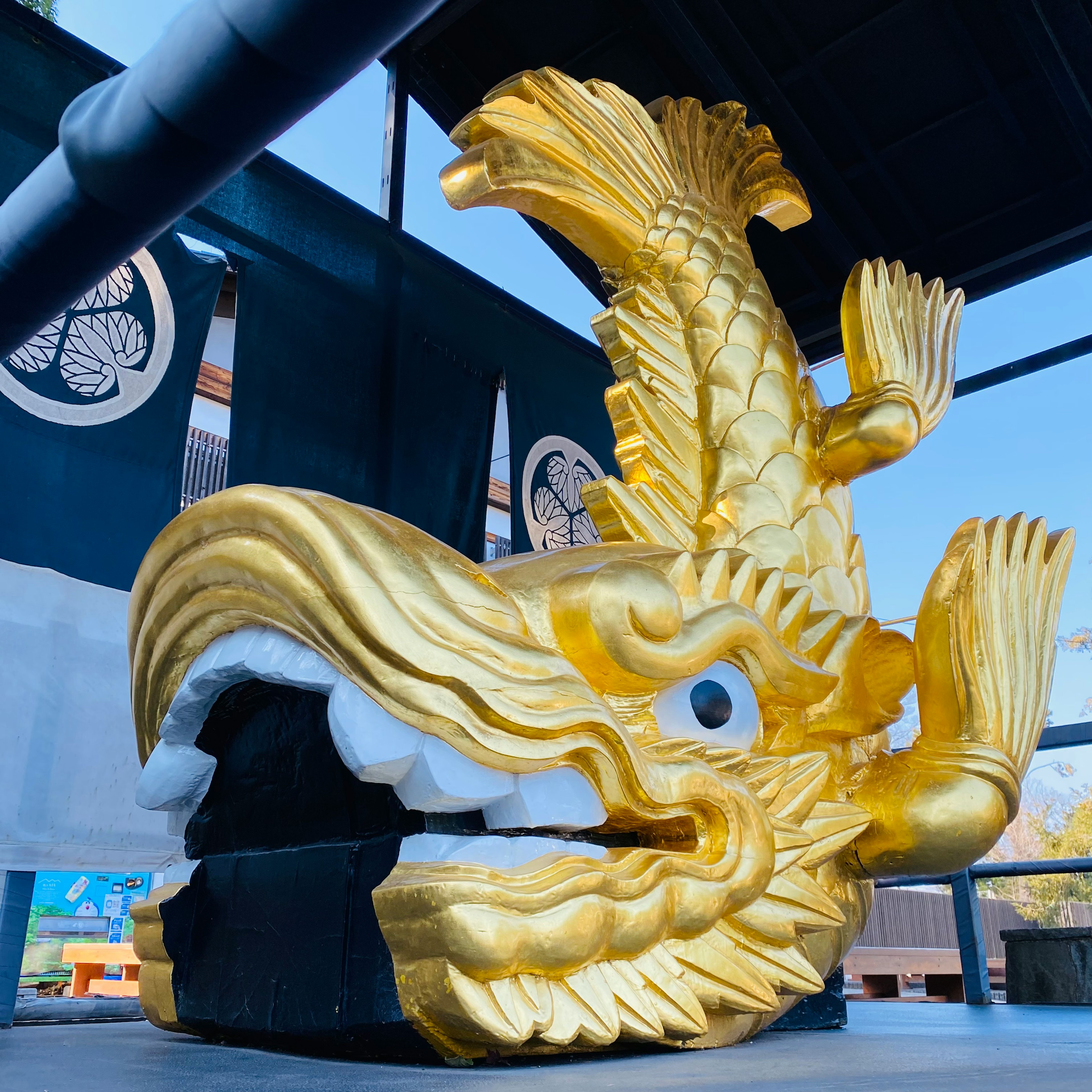 Decorative sculpture featuring a golden dragon head