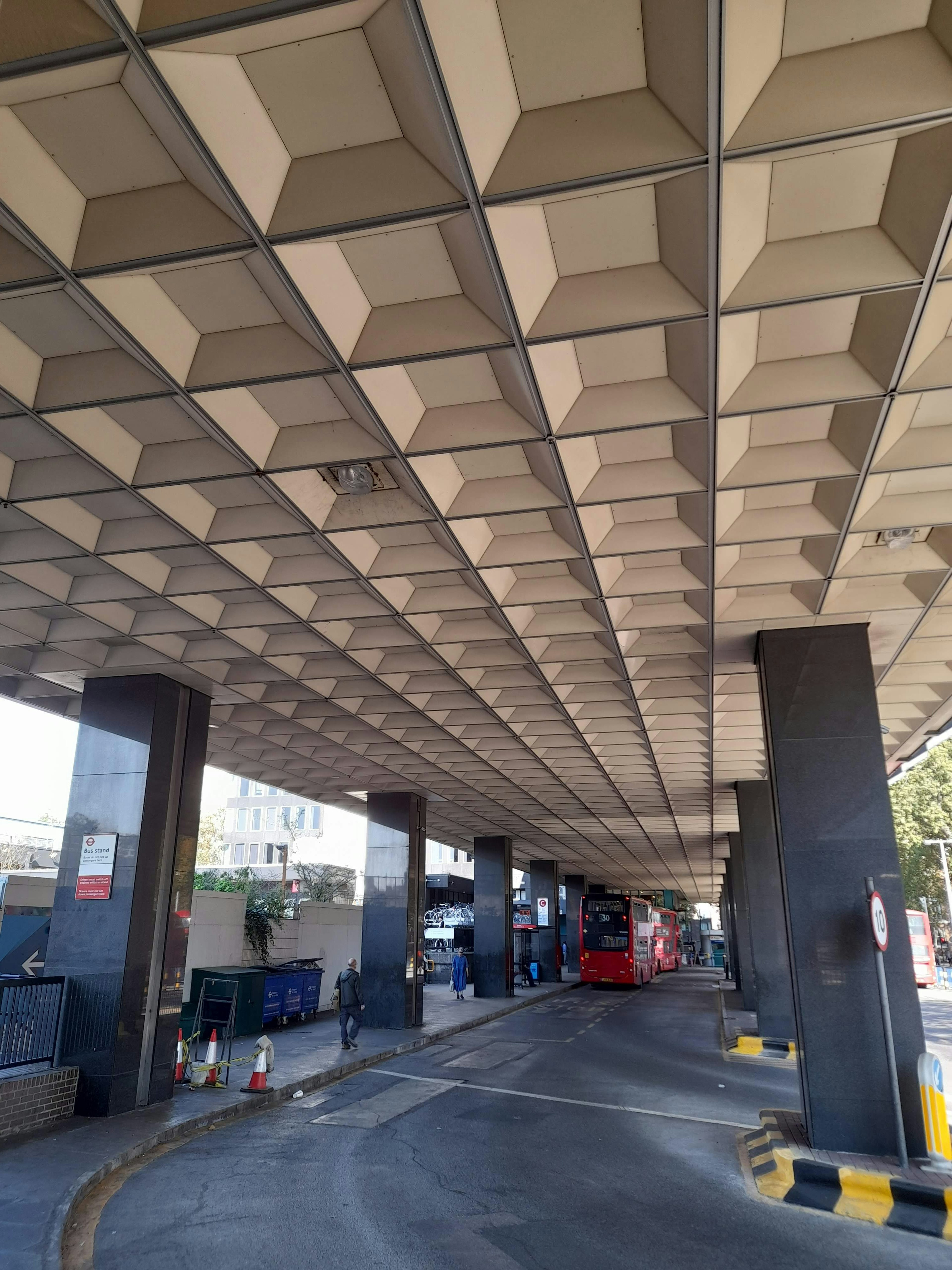 Geometric patterned ceiling in a building's underpass