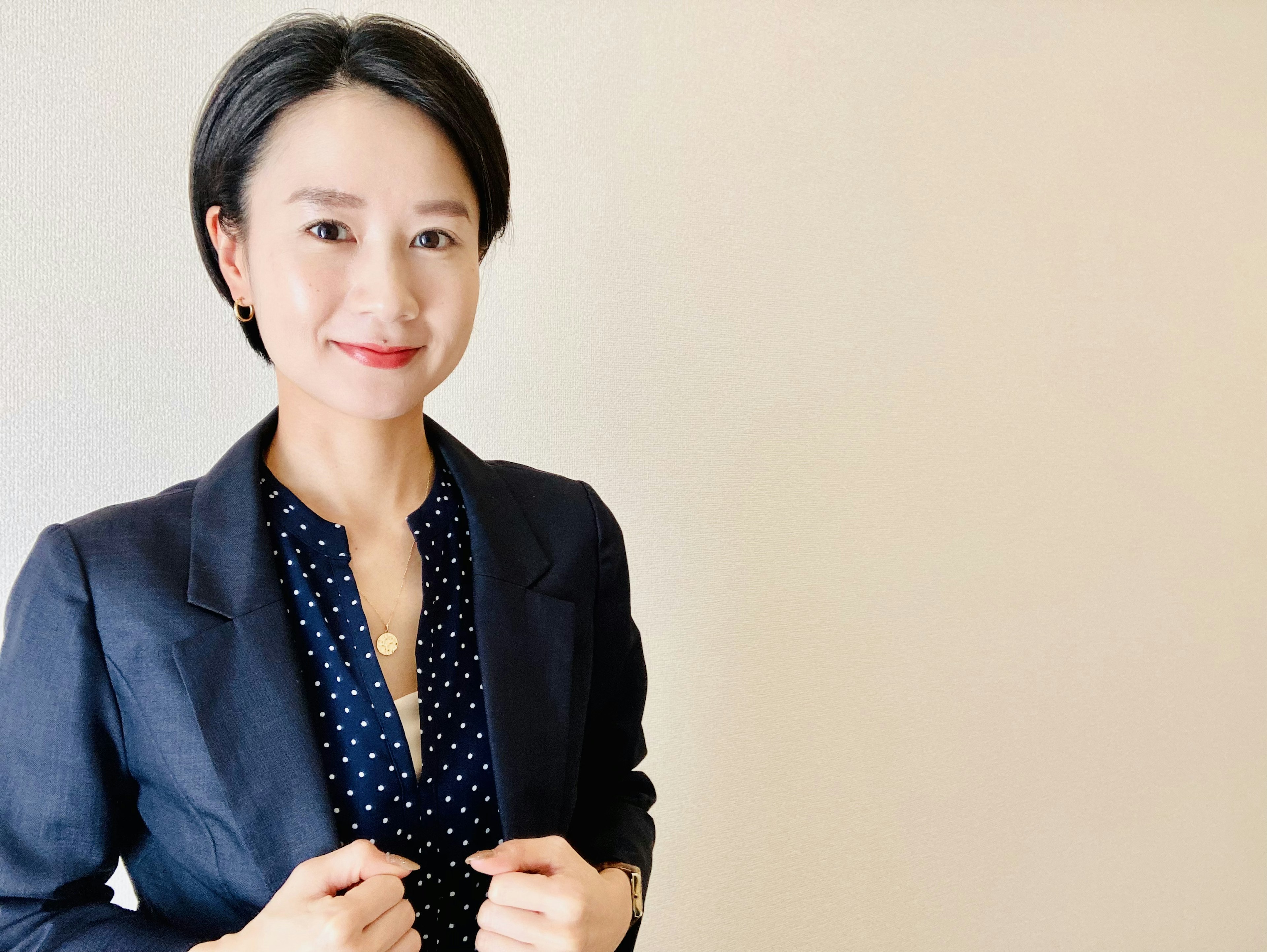 Portrait of a woman in a business suit smiling