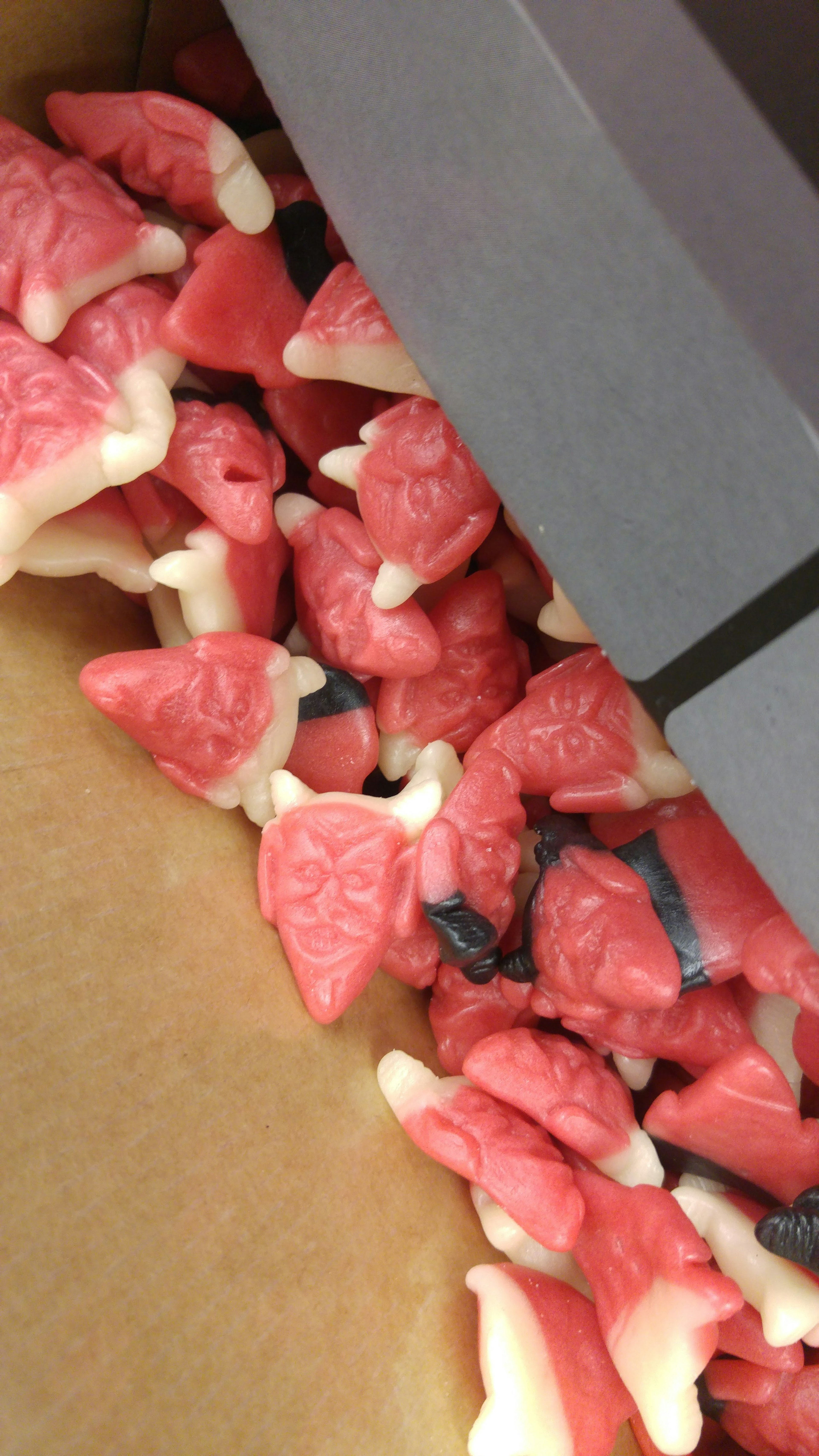 A box filled with red and white heart-shaped candies