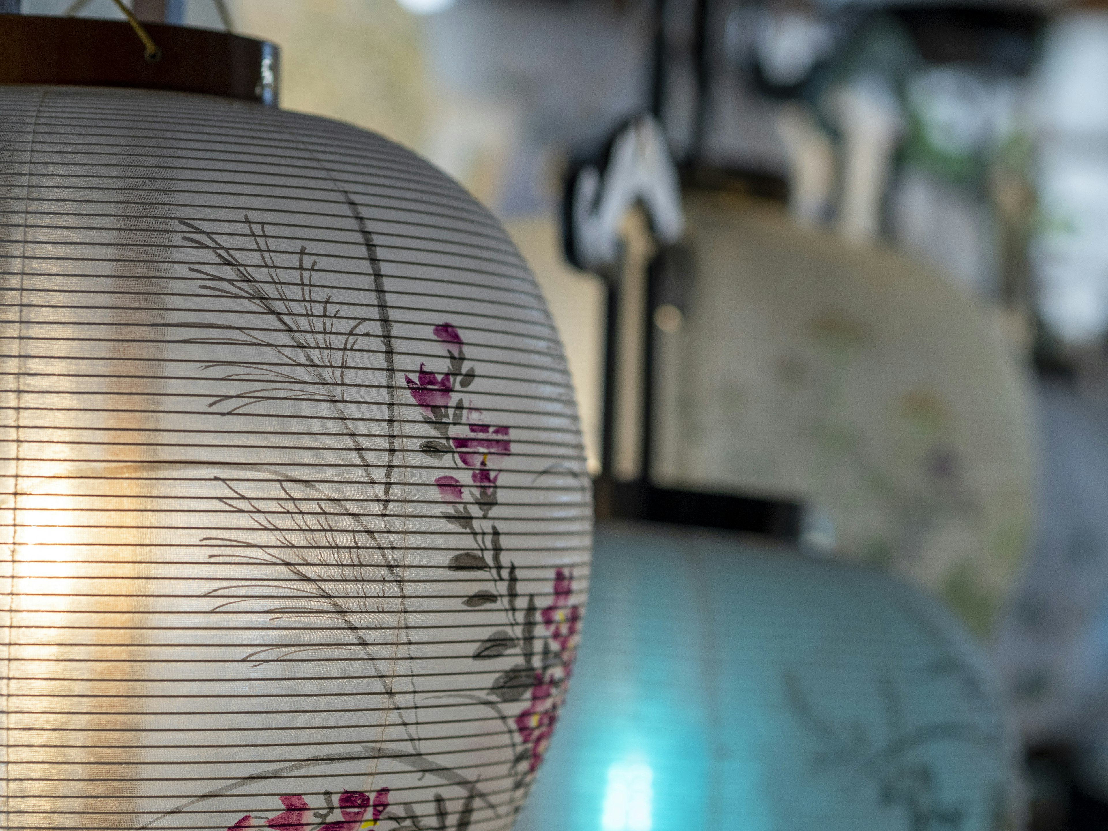 Japanese-style lanterns featuring delicate floral patterns