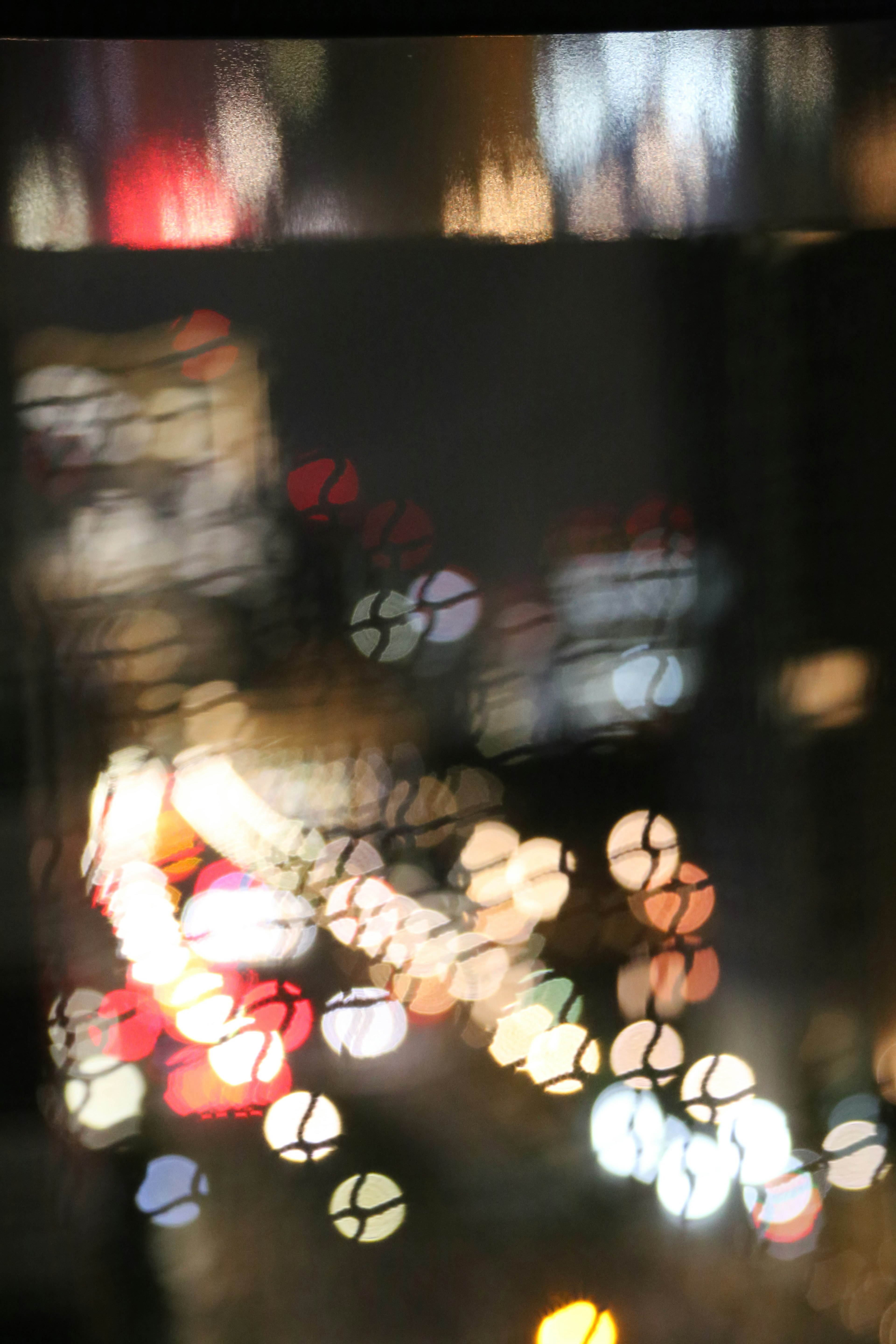 Blurred city nightscape with colorful light bokeh