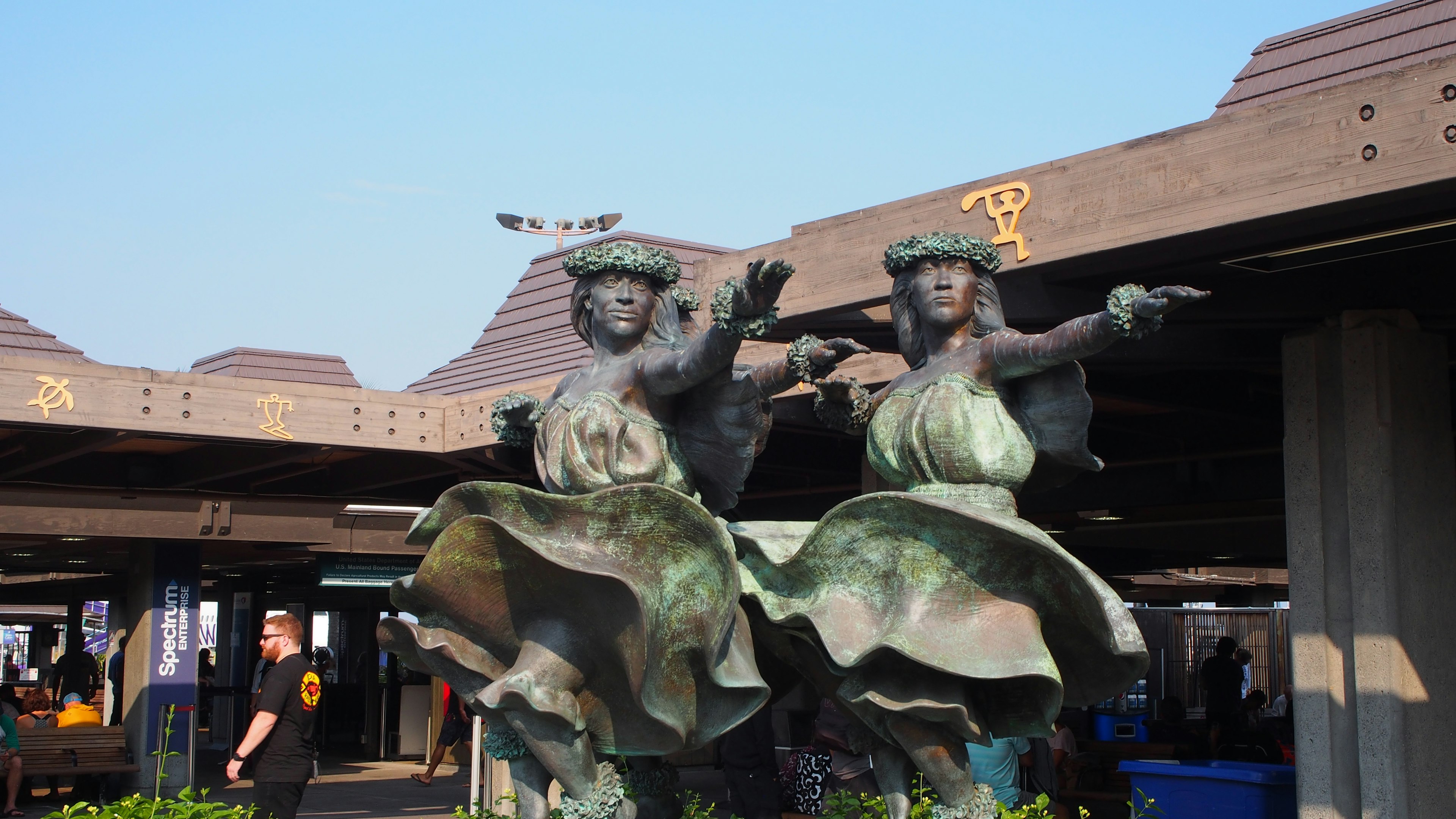 Statue of two dancing women with flowing dresses