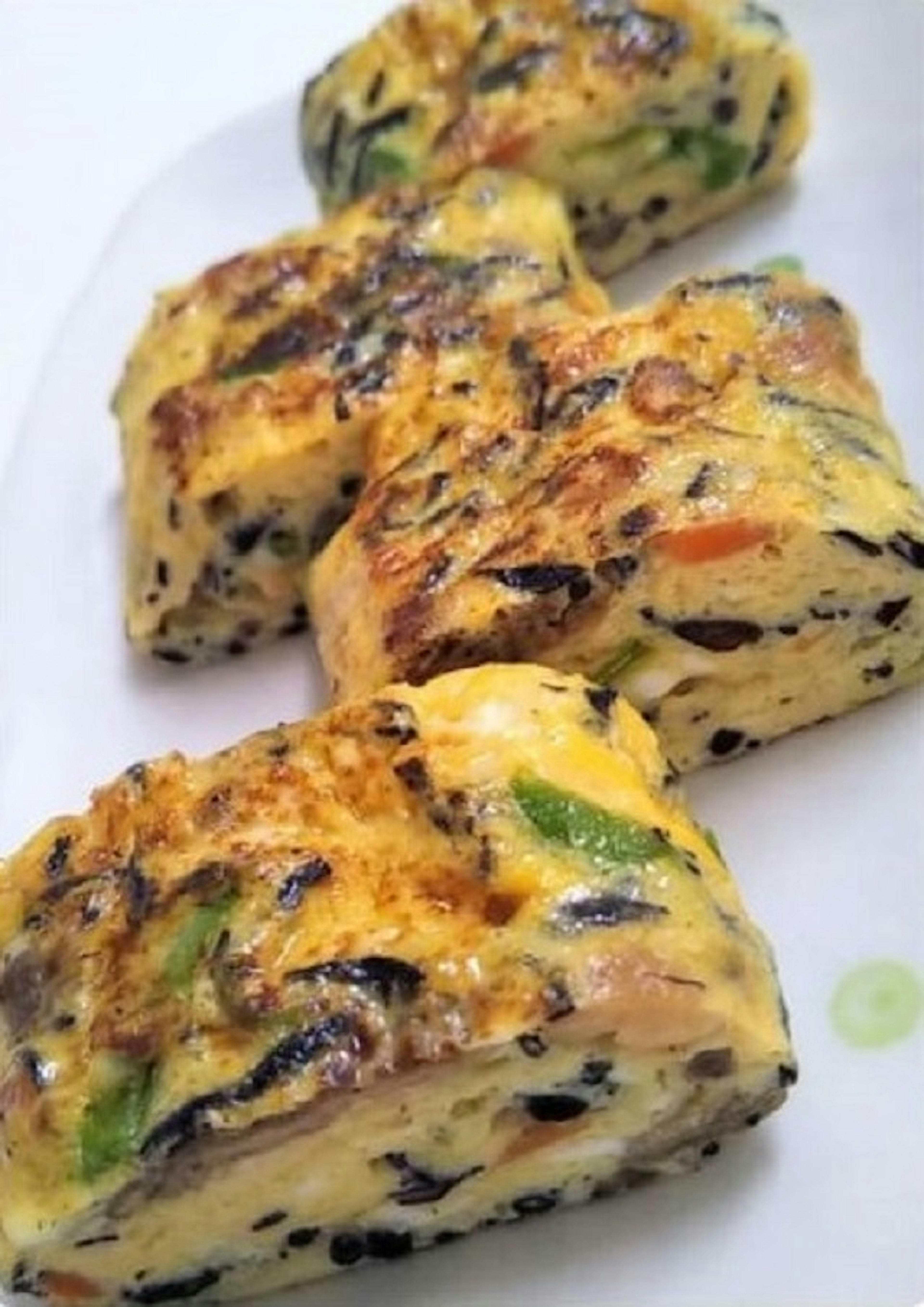 Sliced egg roll with colorful vegetables