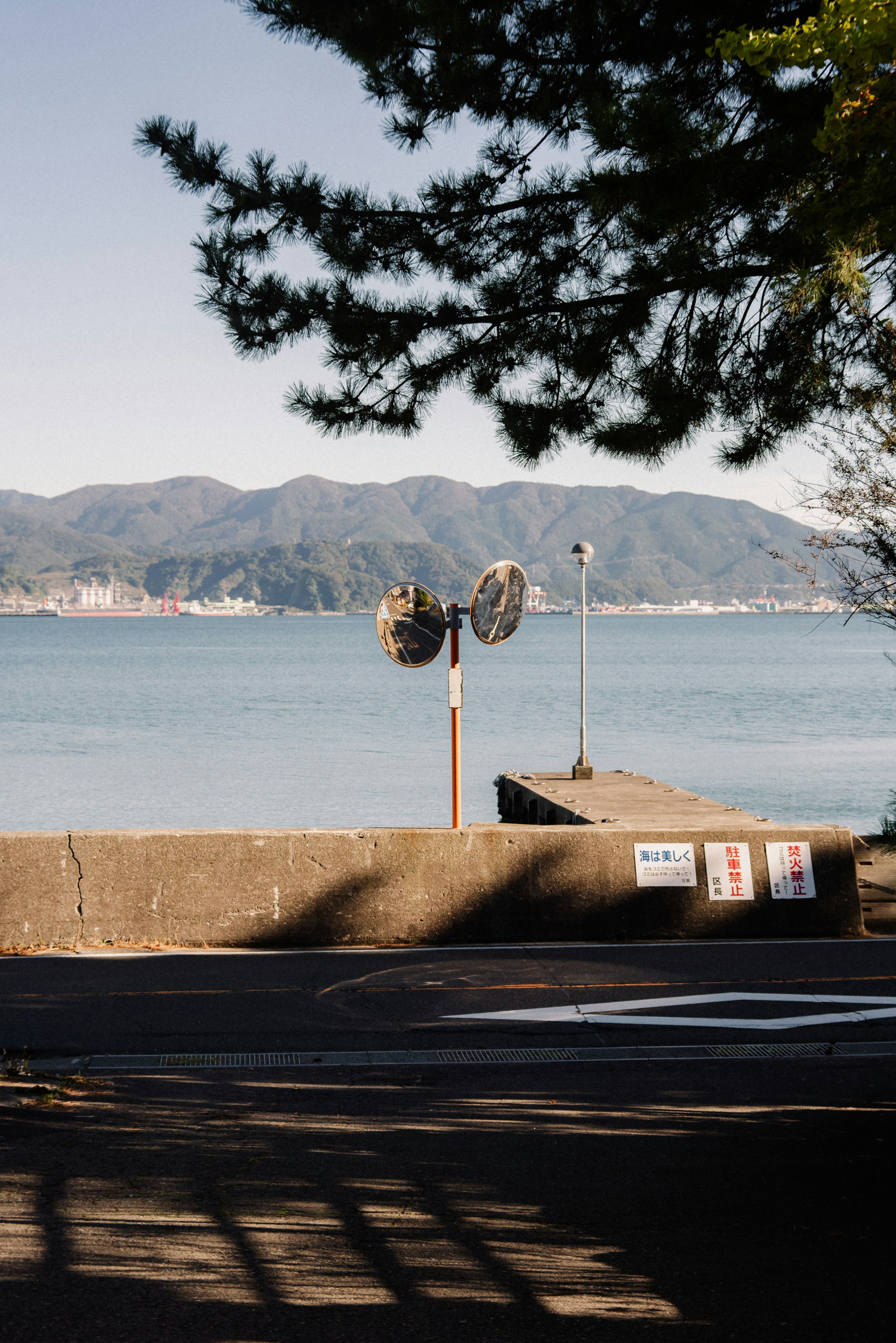 Harbor view featuring mountains and calm water