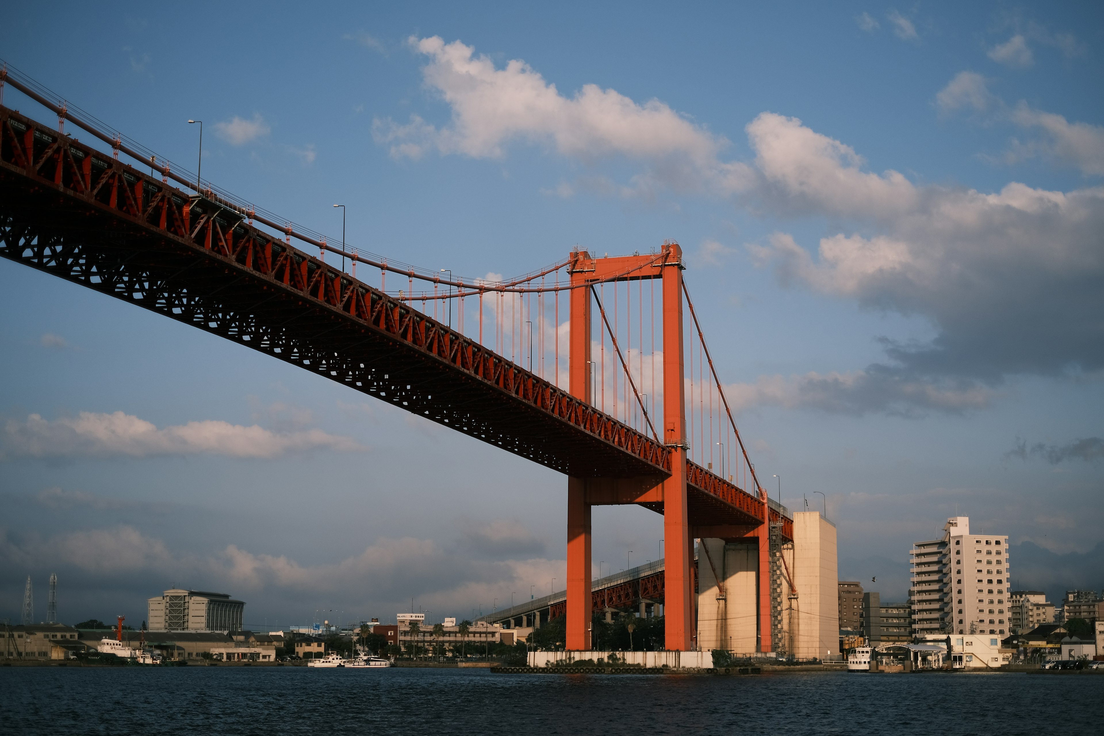 Red bridge against a blue sky