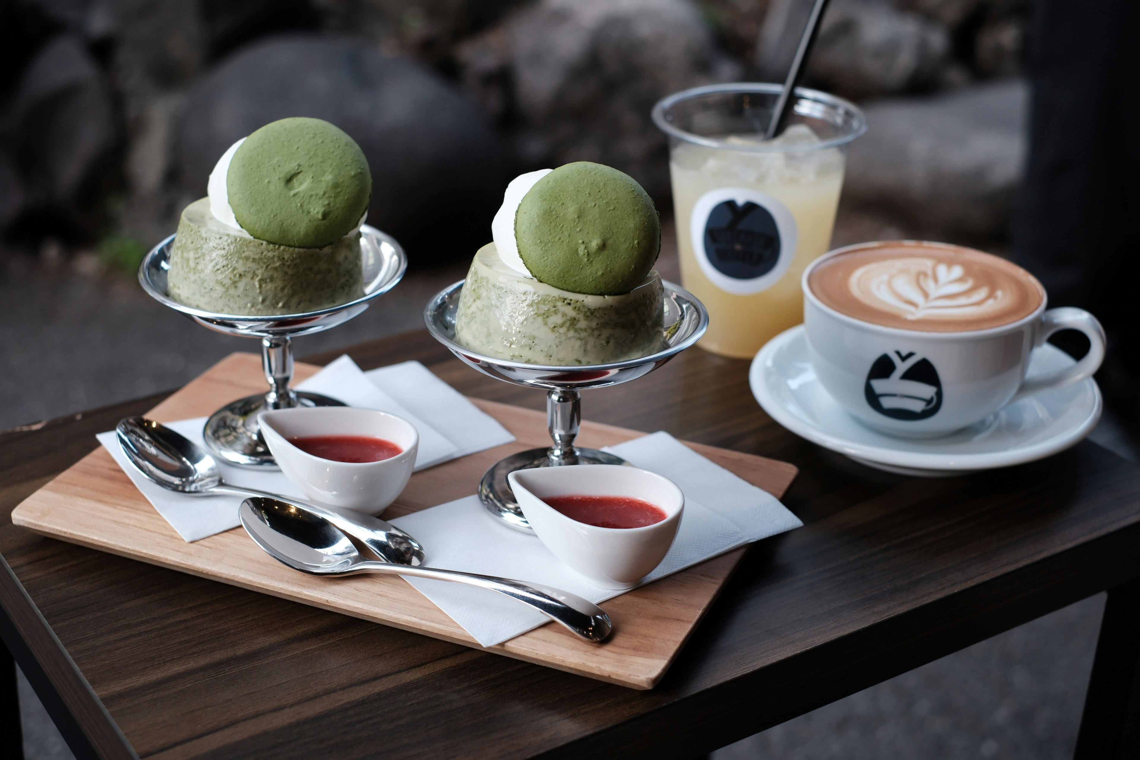 Matcha ice cream and coffee set on a wooden table