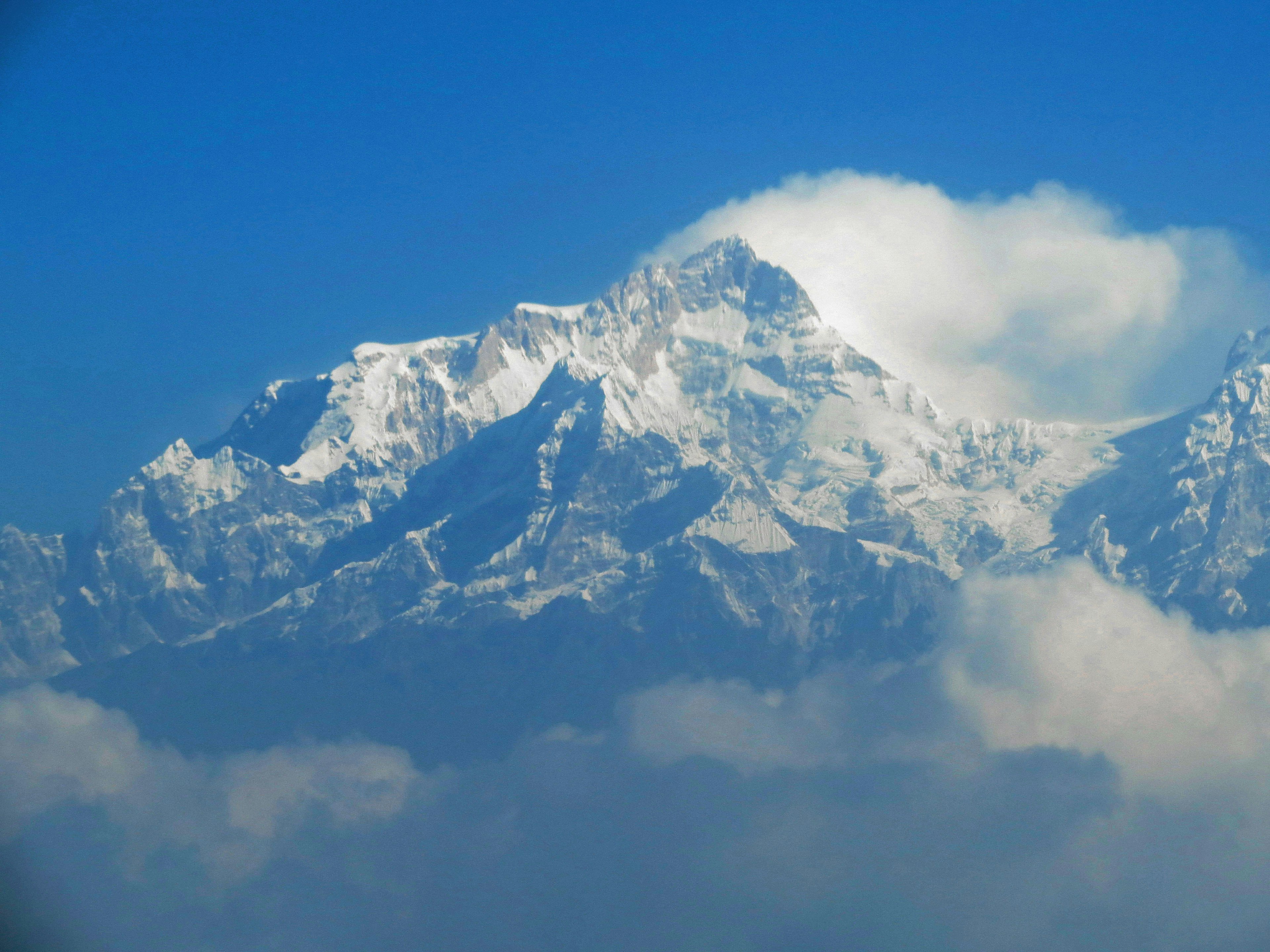 Beautiful view of snow-covered mountains under a clear blue sky