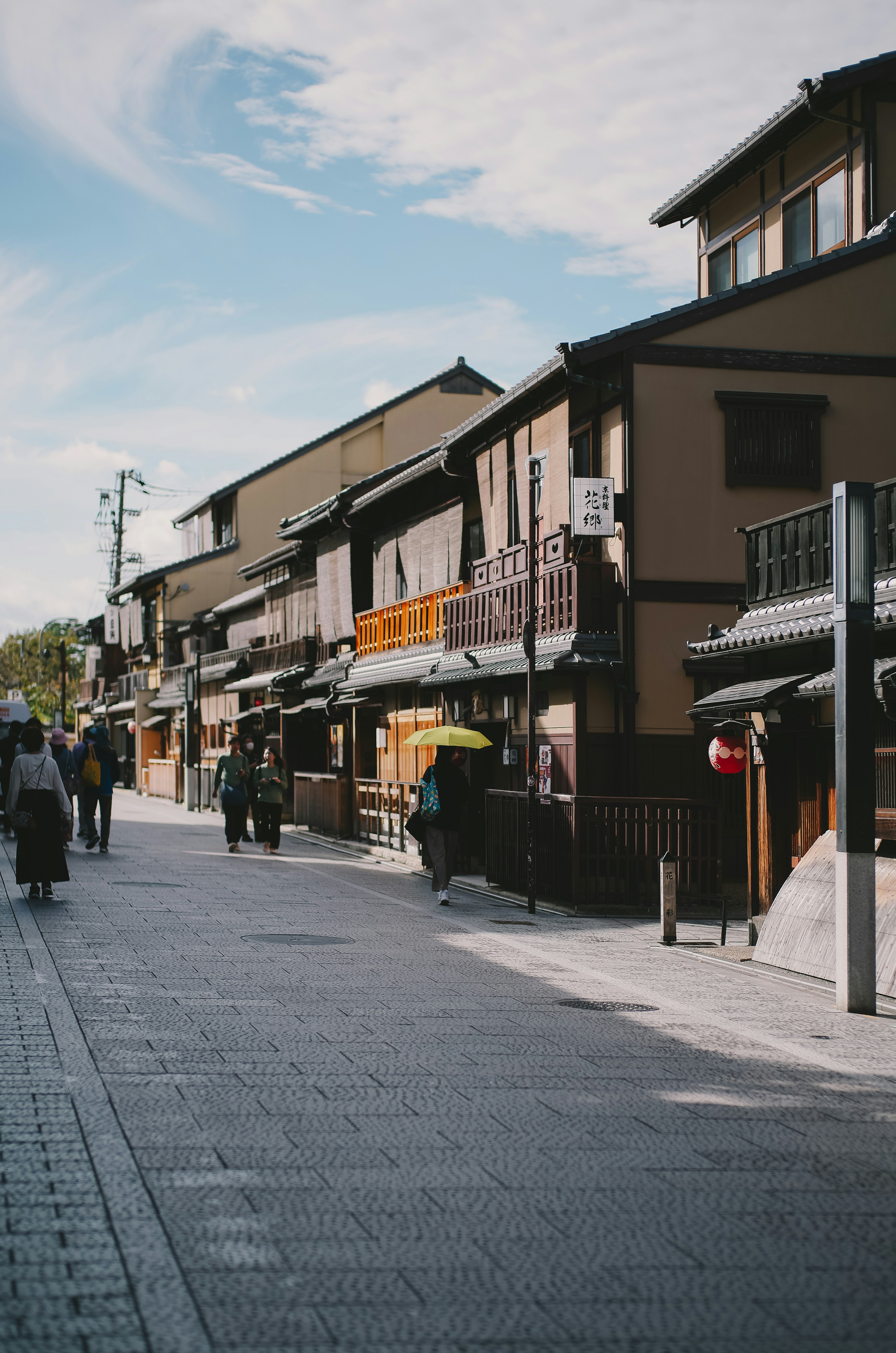 Street view with traditional buildings and pedestrians