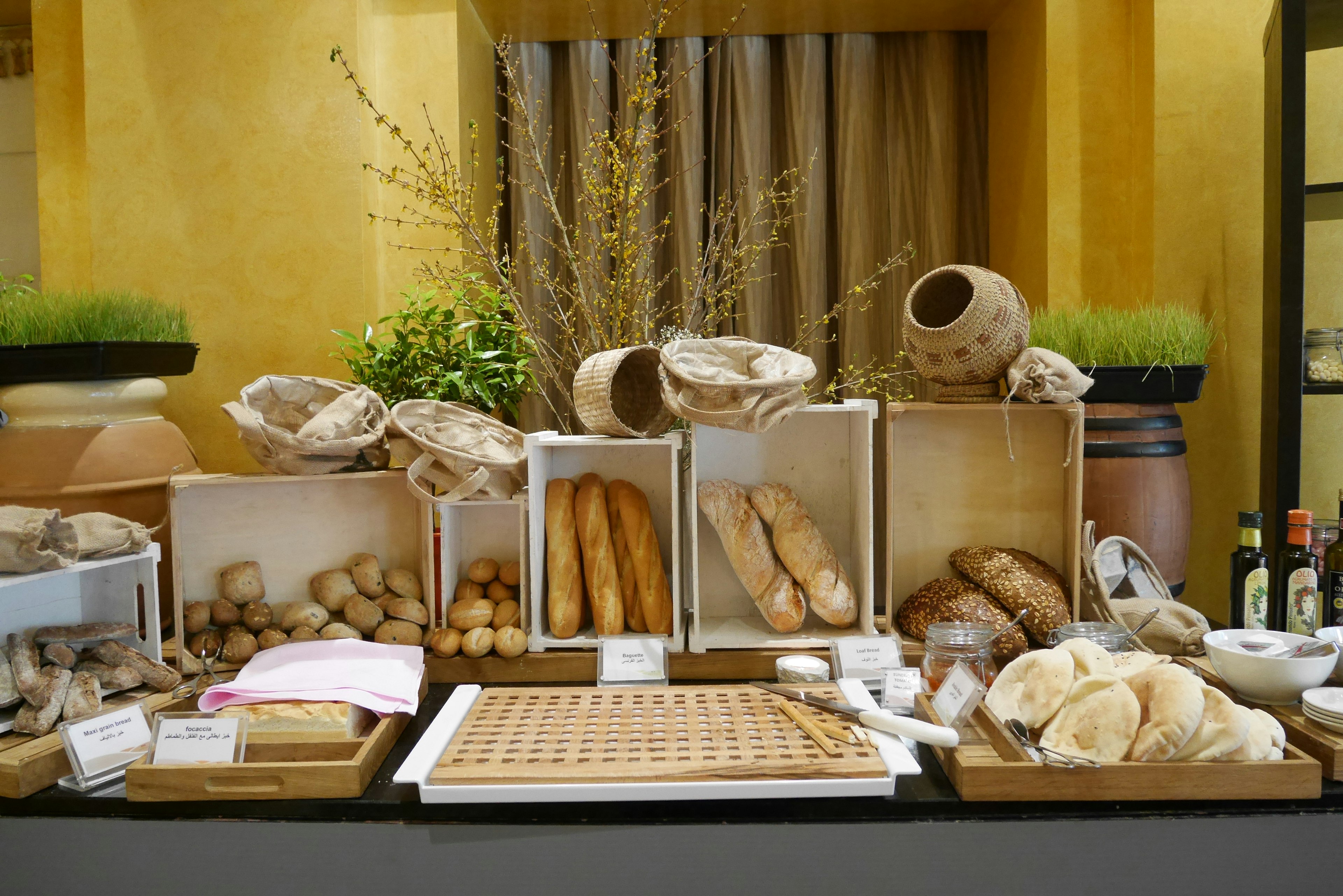 A beautiful buffet table displaying various breads and pastries