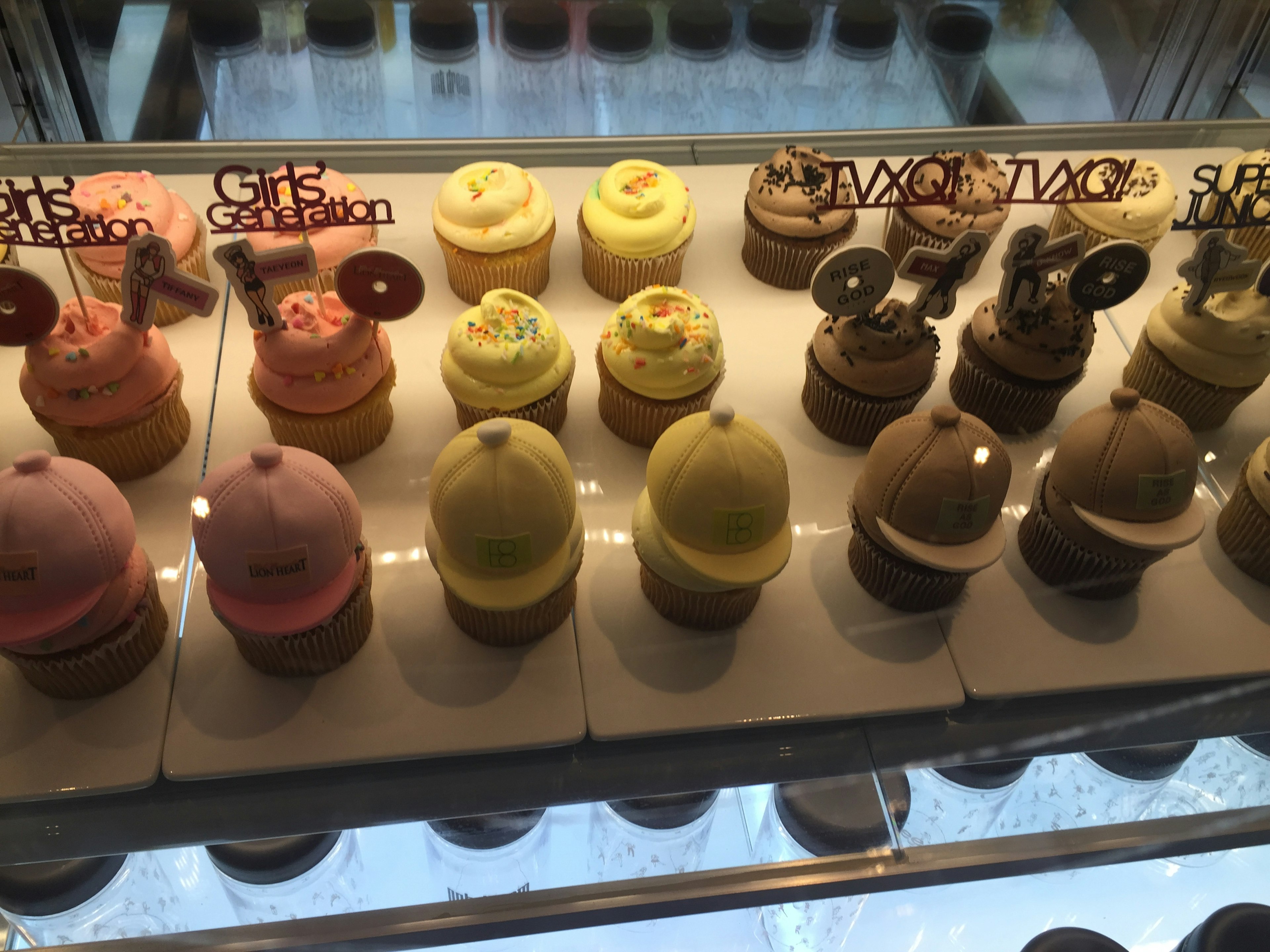 Display of colorful ice cream cups arranged in a row