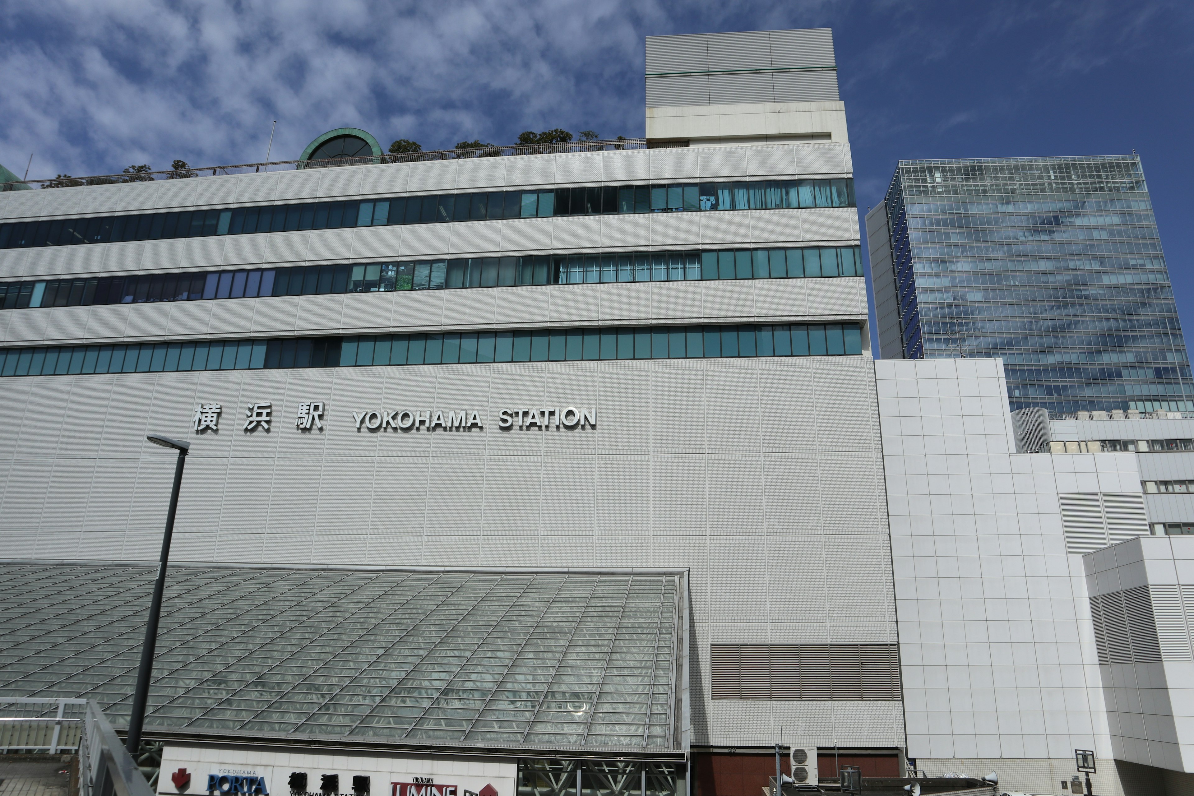 Modern building facade with blue sky background