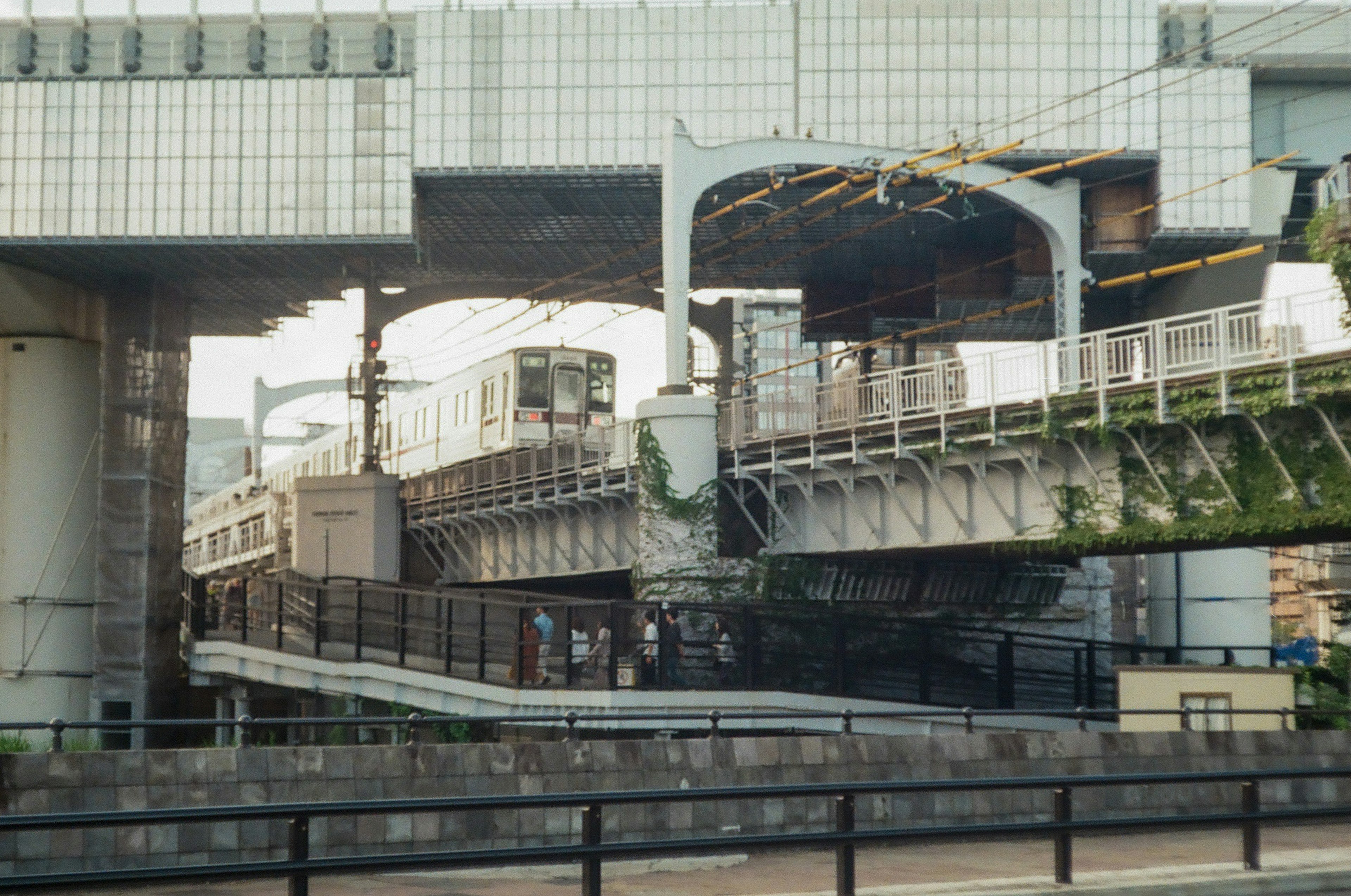 Urban elevated train crossing scene