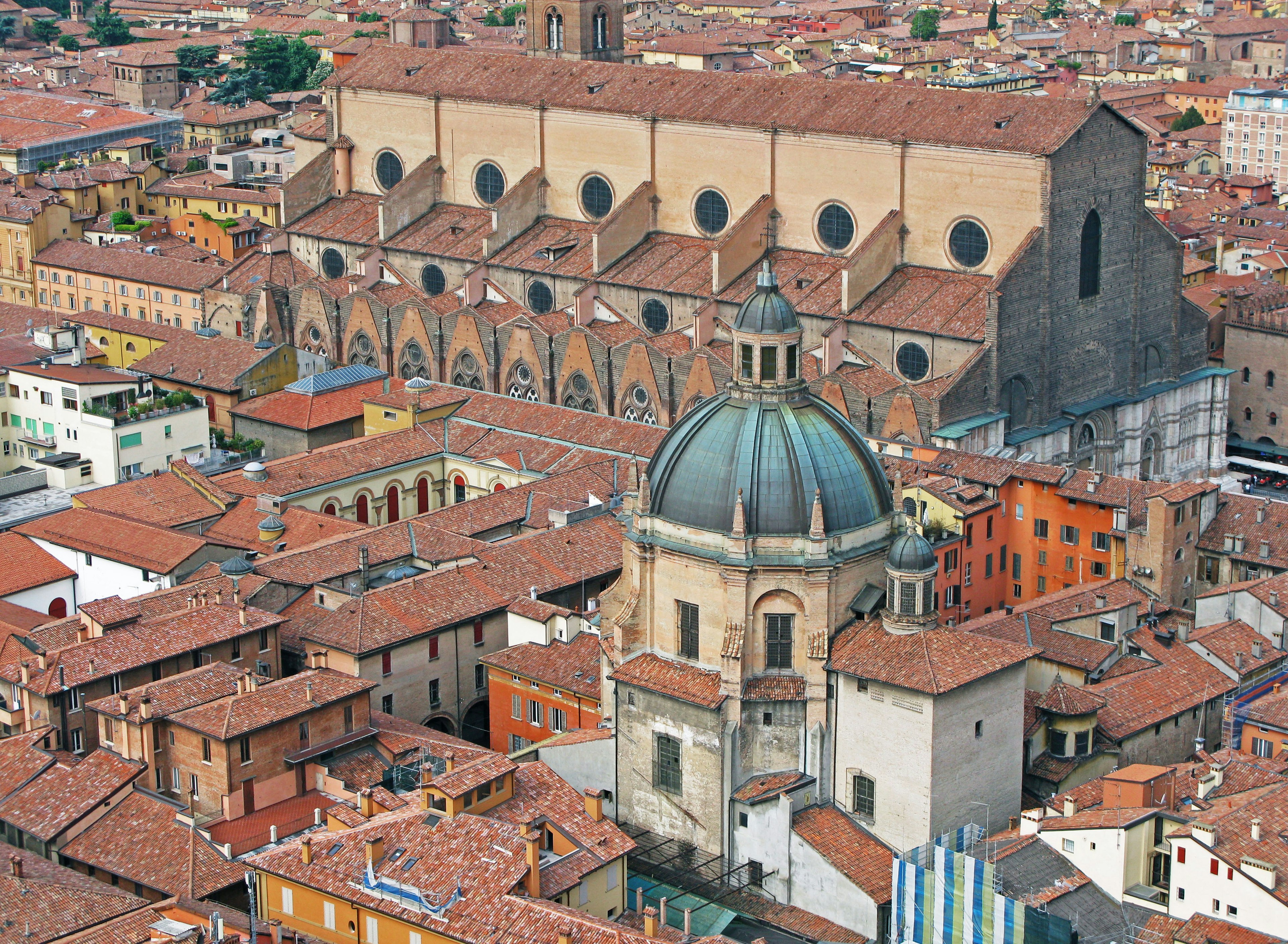 Historic buildings and dome over Bologna rooftops