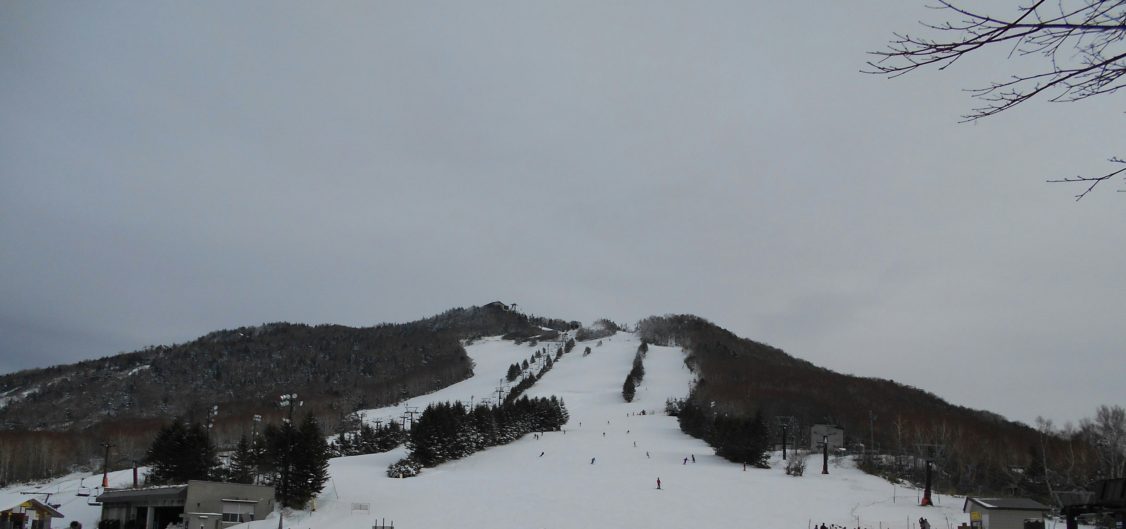 Snow-covered mountain with ski slopes